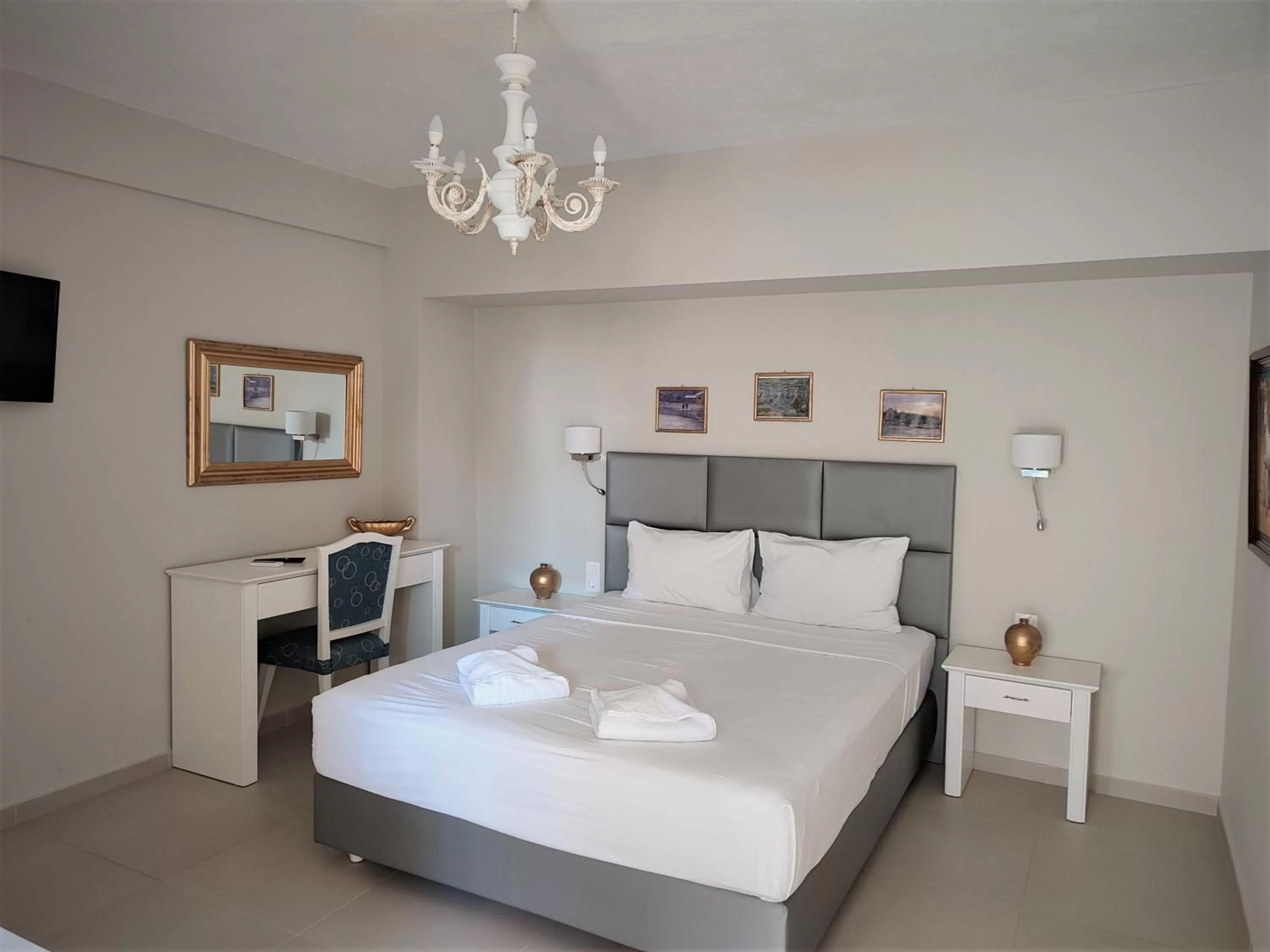 Photo of the whole room, Bed in Light Blue Hotel