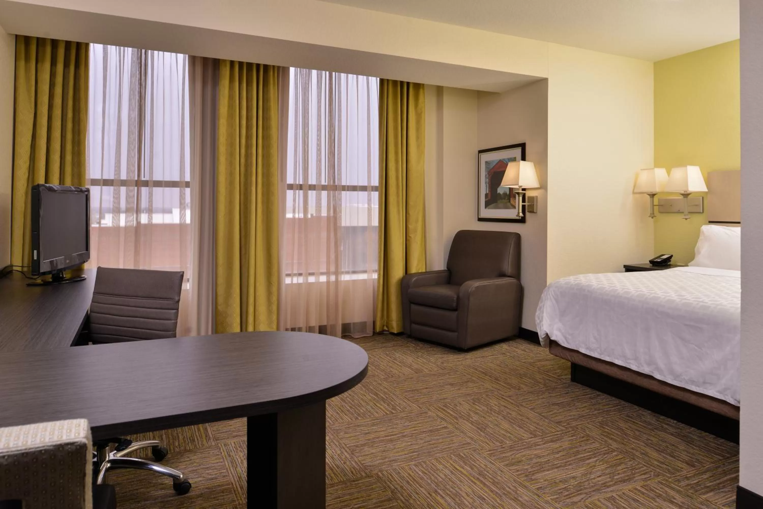 Photo of the whole room, Bed in Candlewood Suites Terre Haute by IHG