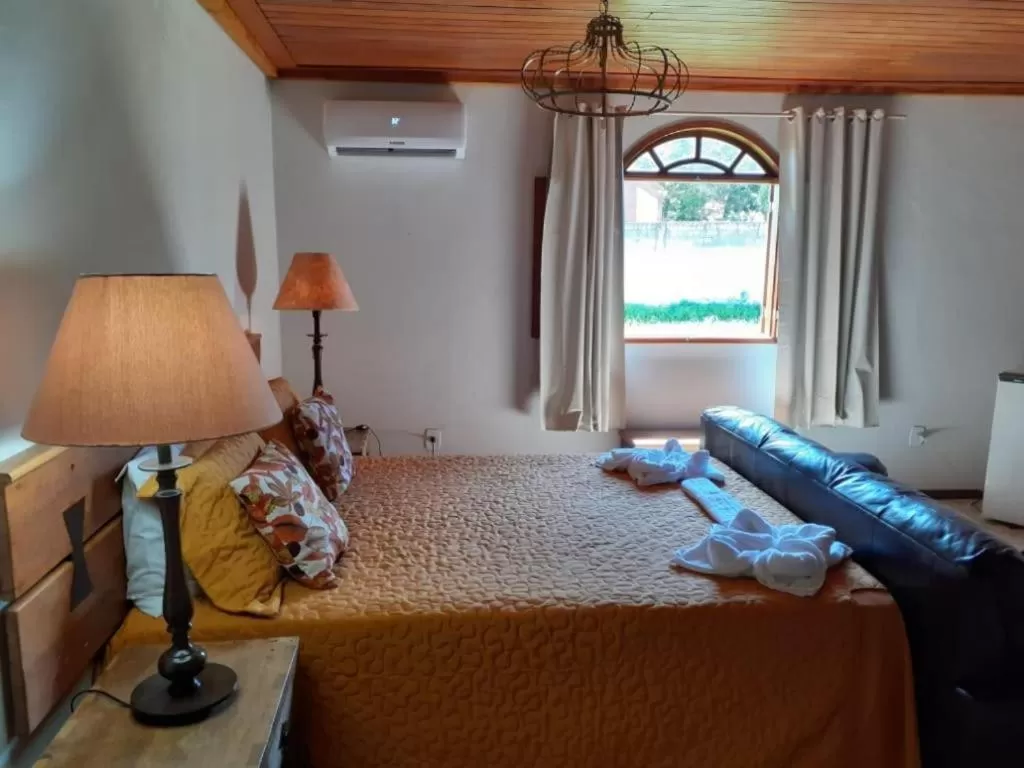 Bed in POUSADA CHARLOTTE