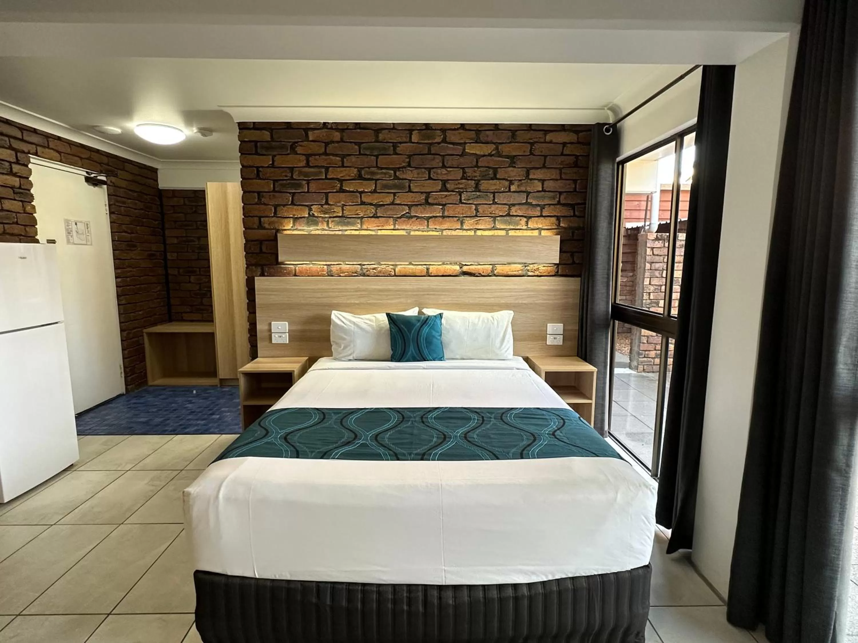 Bed in Logan City Motor Inn