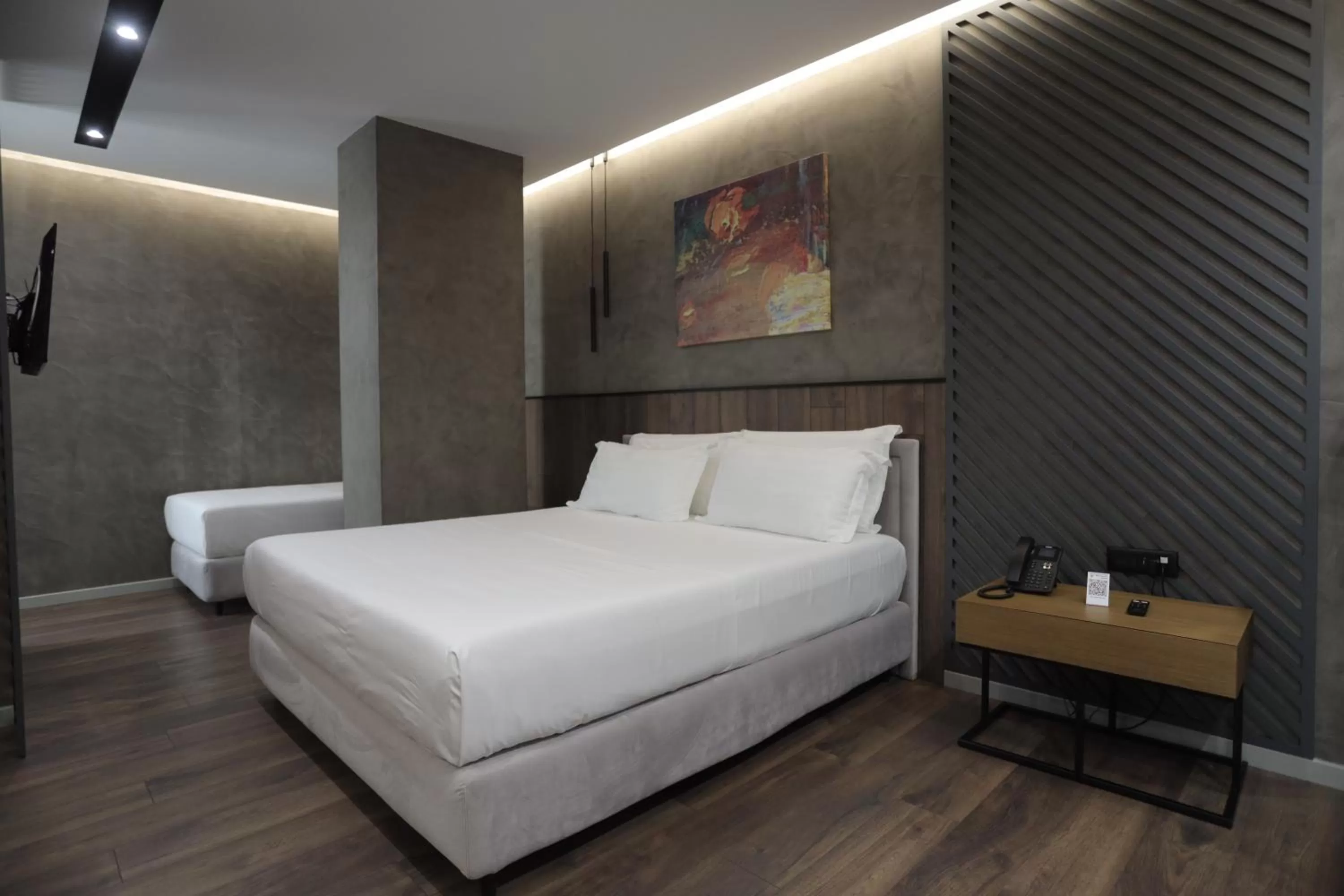 Bed in AP Hotel Boutique