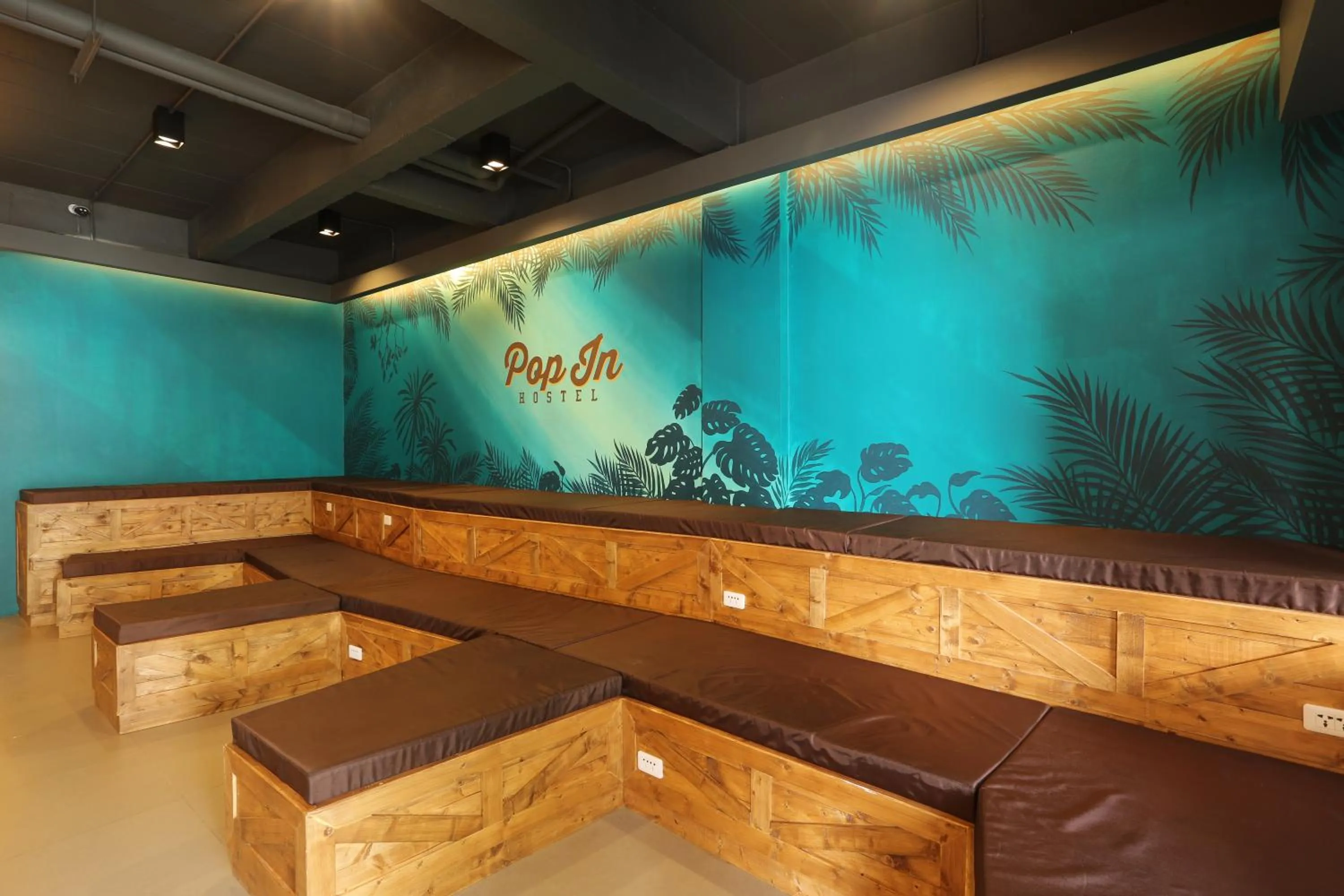 Property logo or sign in Pop-In Aonang