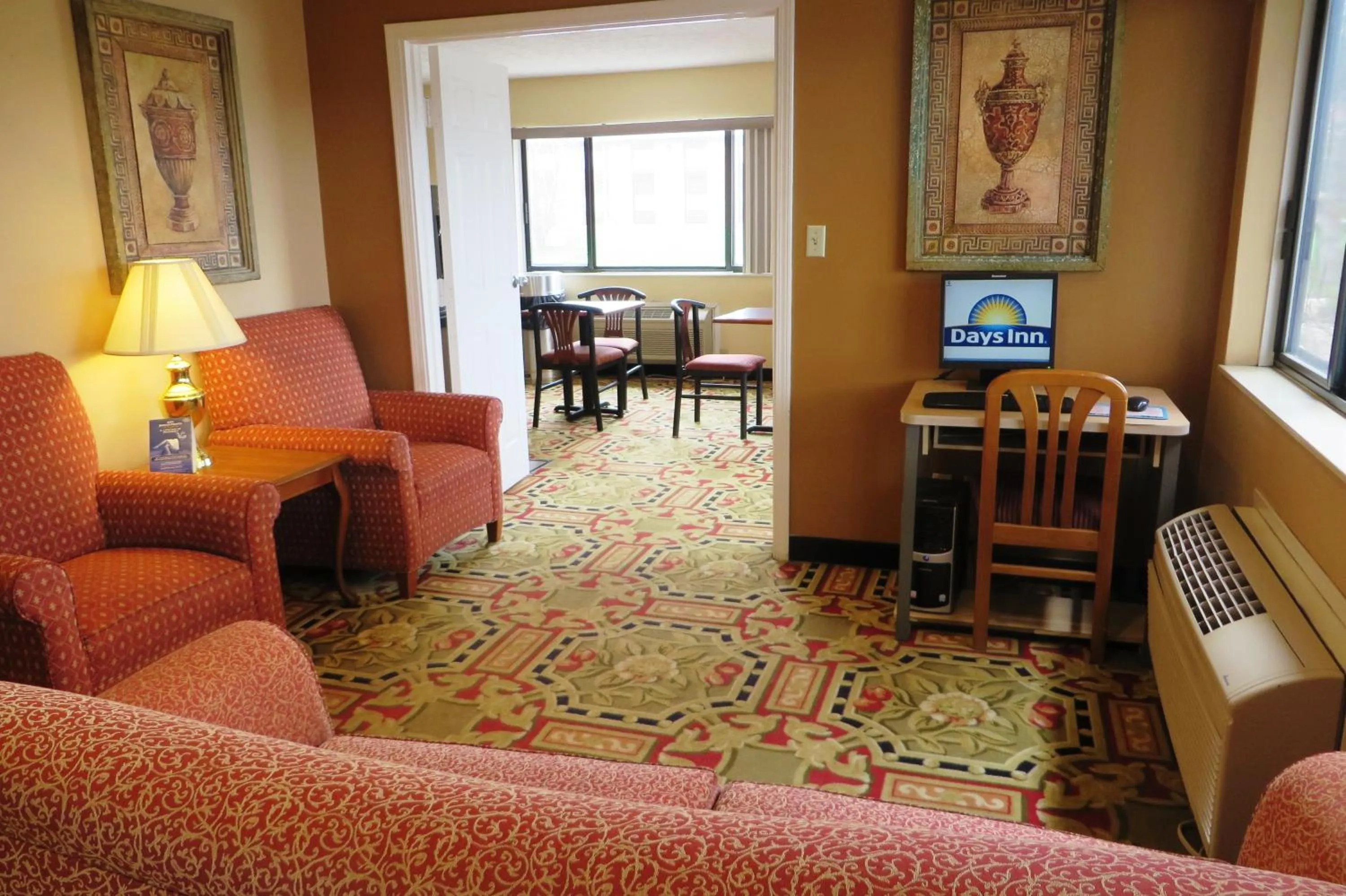 Communal lounge/ TV room in Days Inn by Wyndham Plainfield