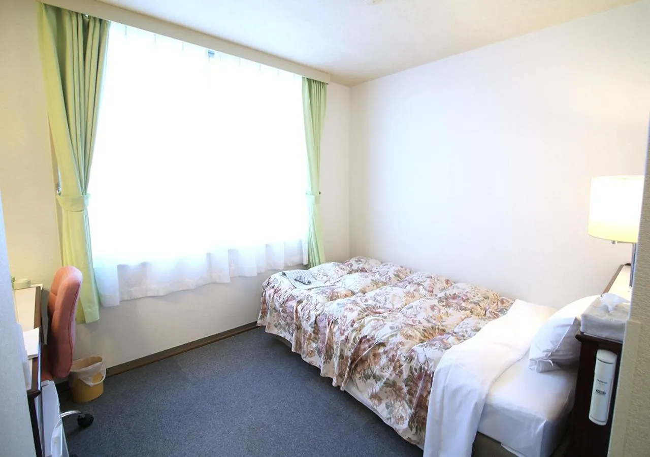 Bed in Royal Inn Shinyamaguchi Ekimae