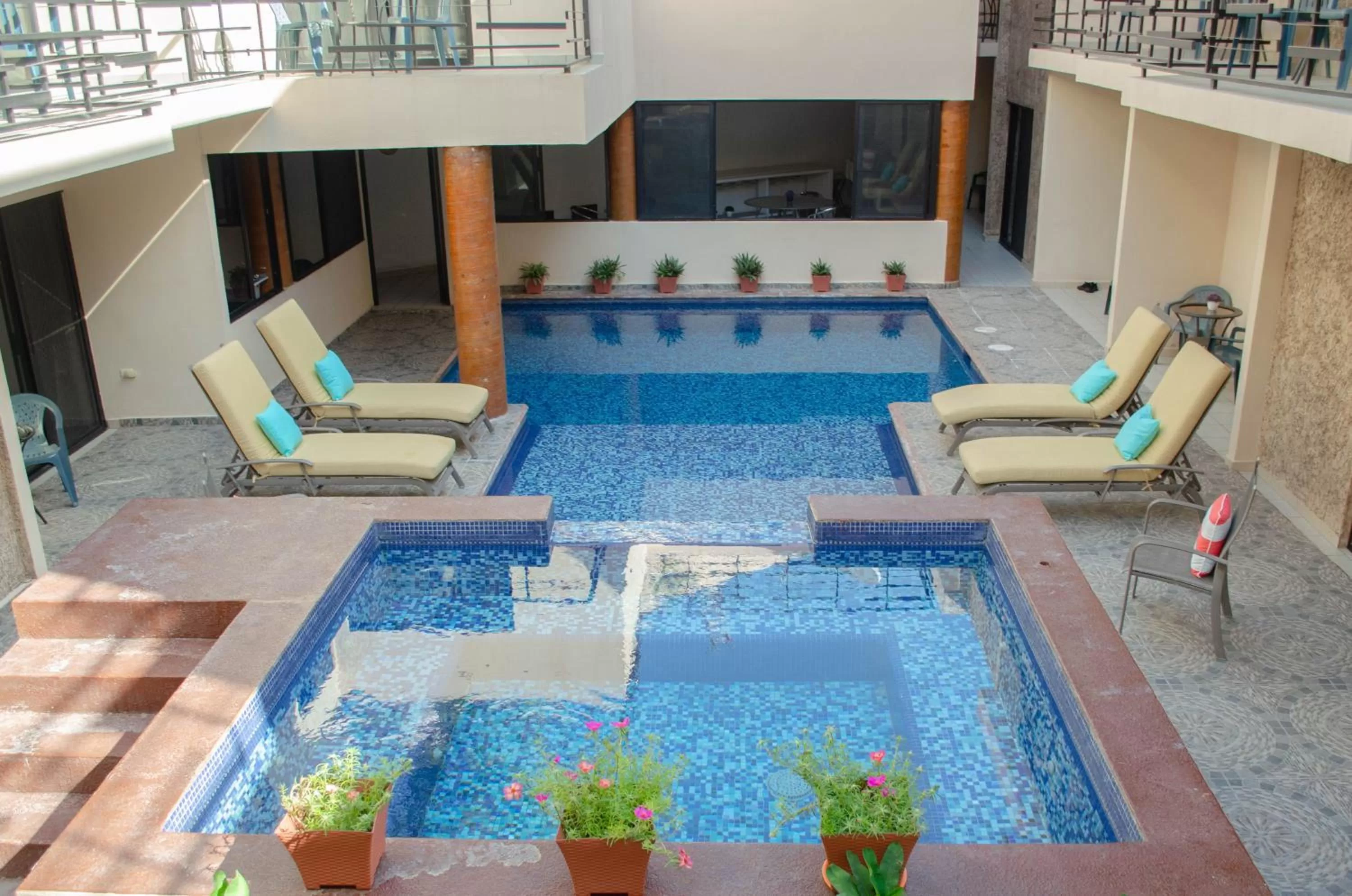 Swimming pool in Pedregal Suites - Marina and Downtown