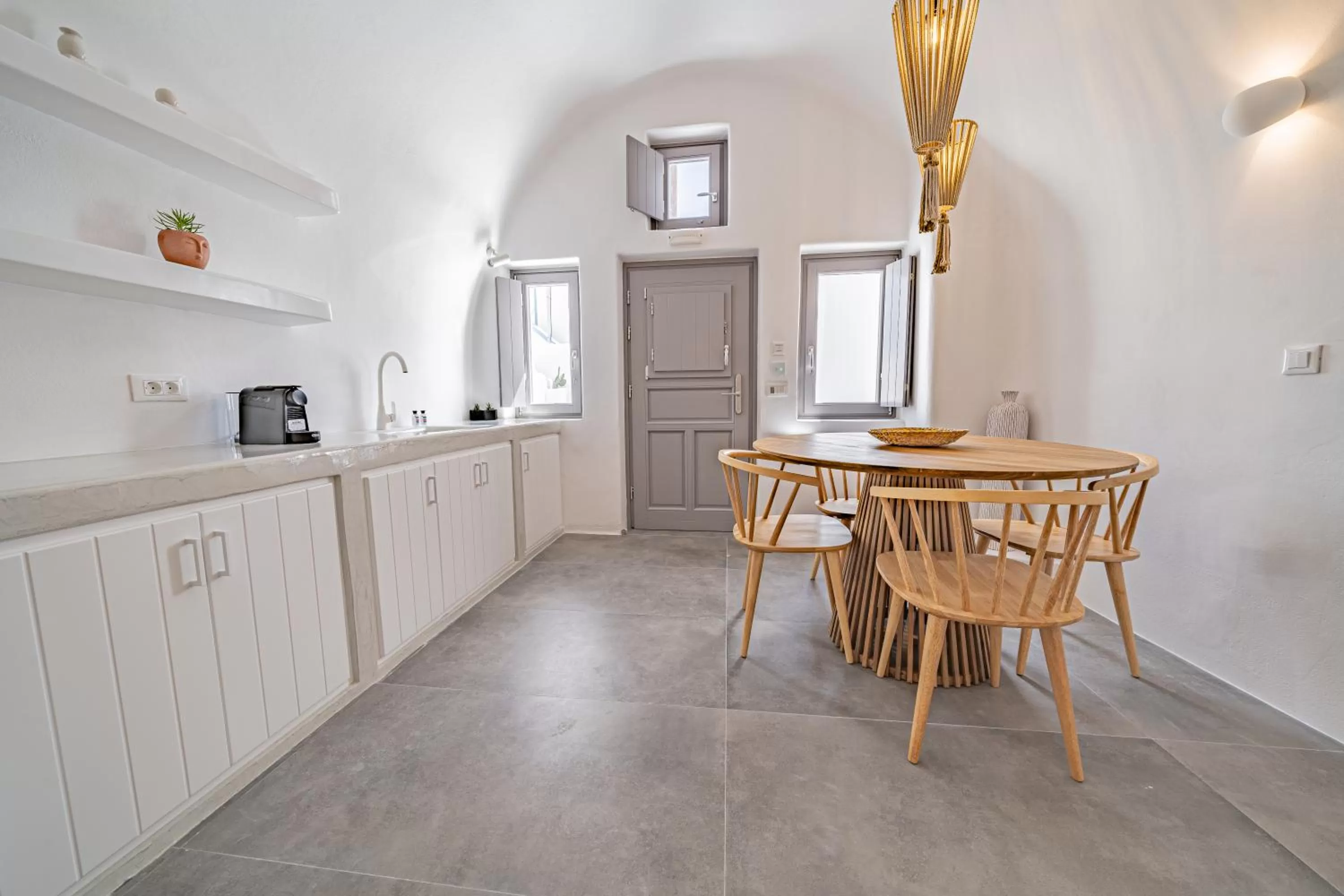 Kitchen or kitchenette in Eternity Suites Santorini