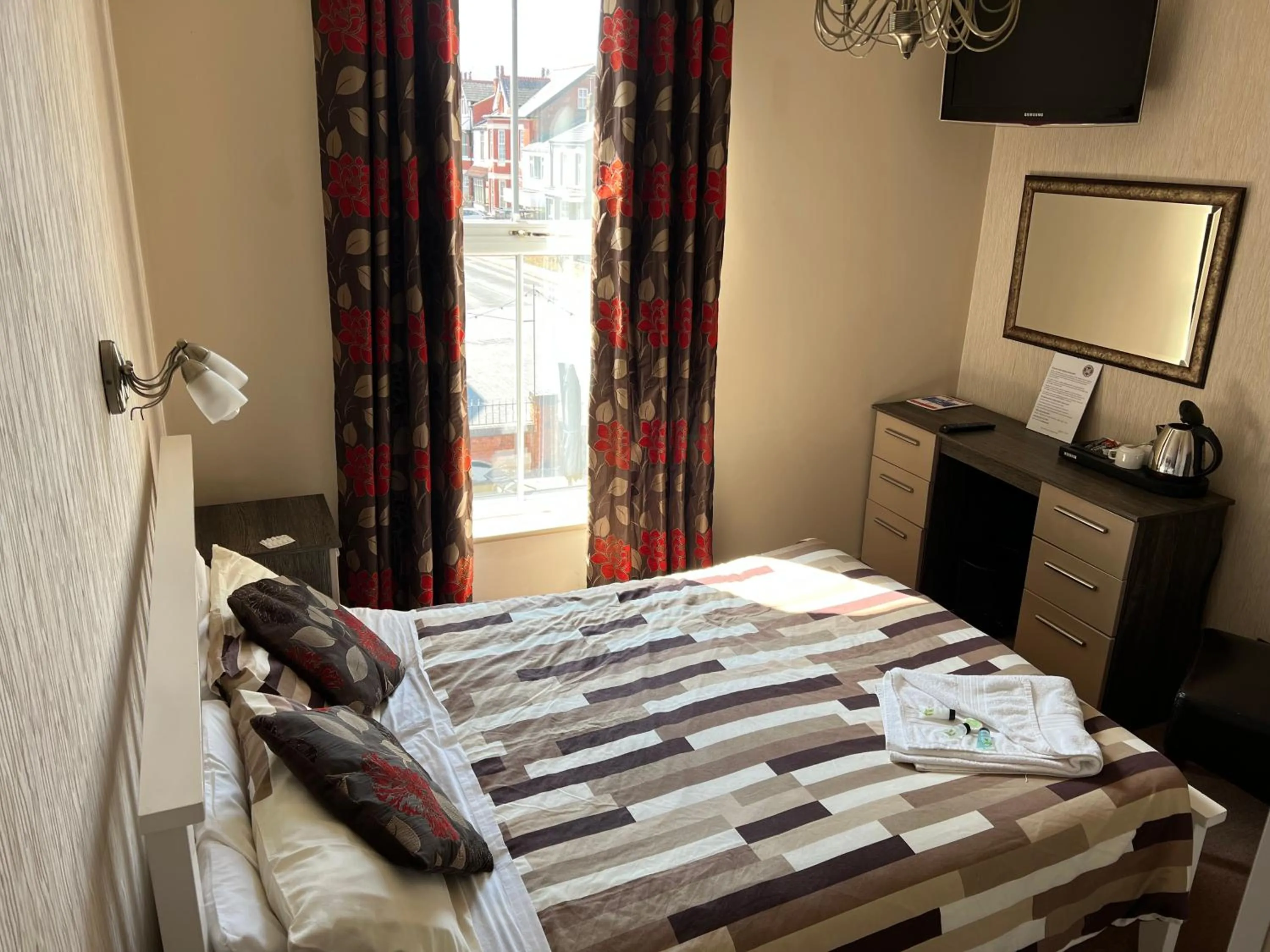 Bed in Southport Metro Hotel