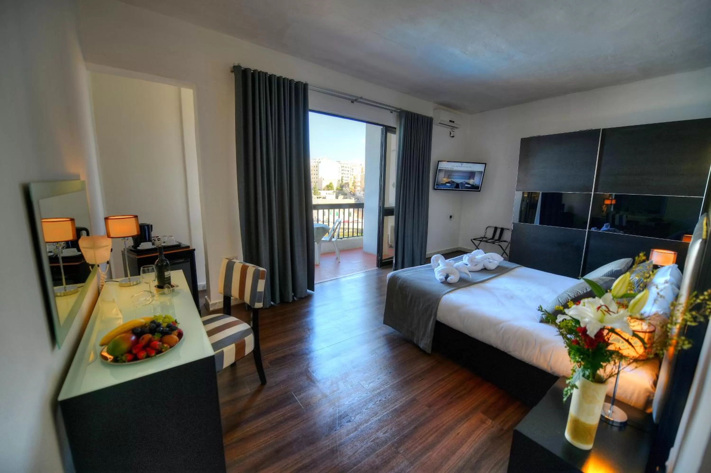 Photo of the whole room, Bed in St. Julian's Bay Hotel