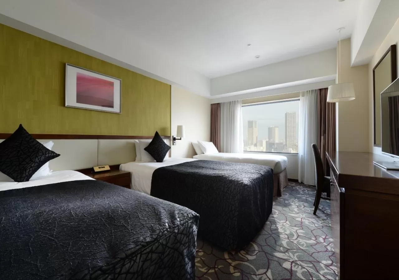 Bed in Hotel Metropolitan Tokyo Ikebukuro