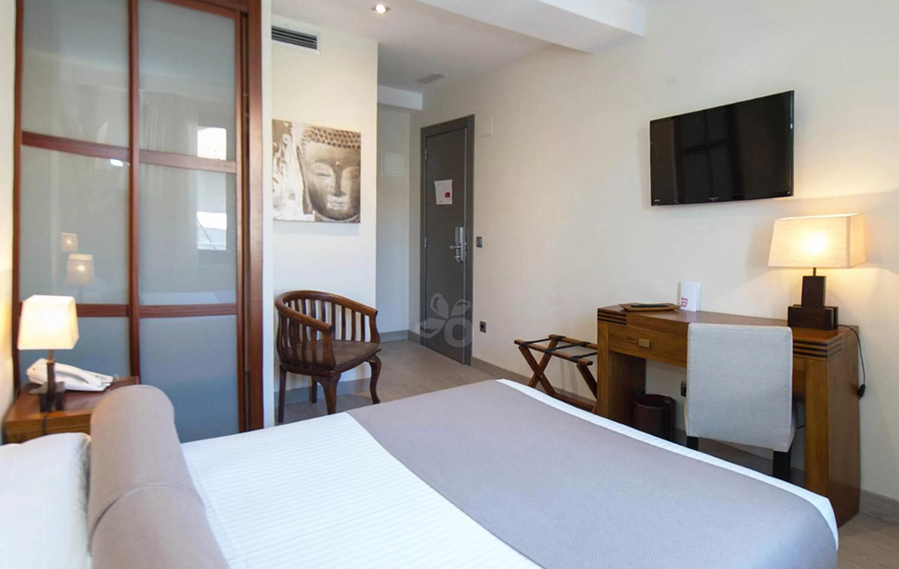 Bed in Le Petit Boutique Hotel