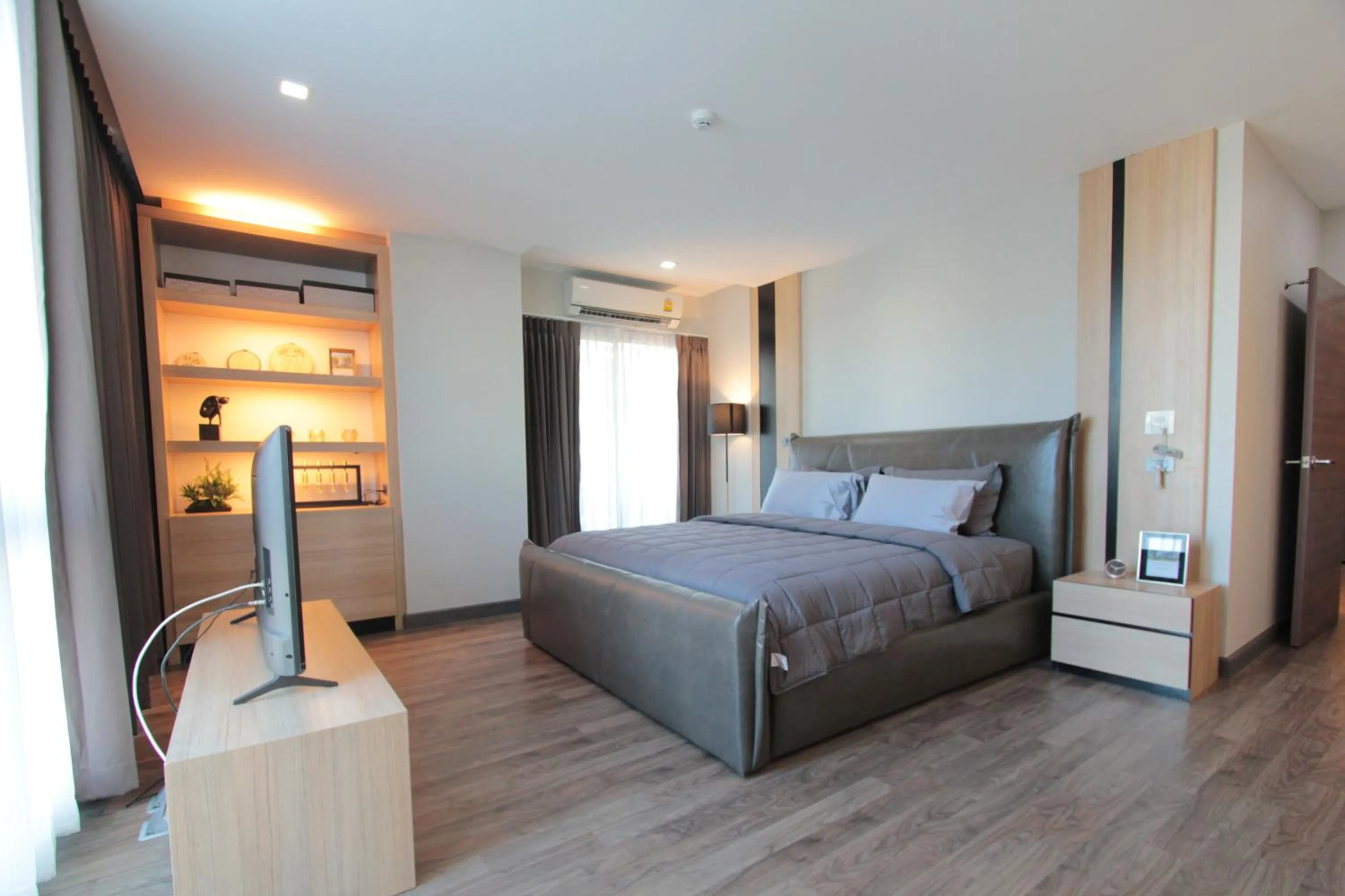 Bed in Wellness Chiang Mai Hotel