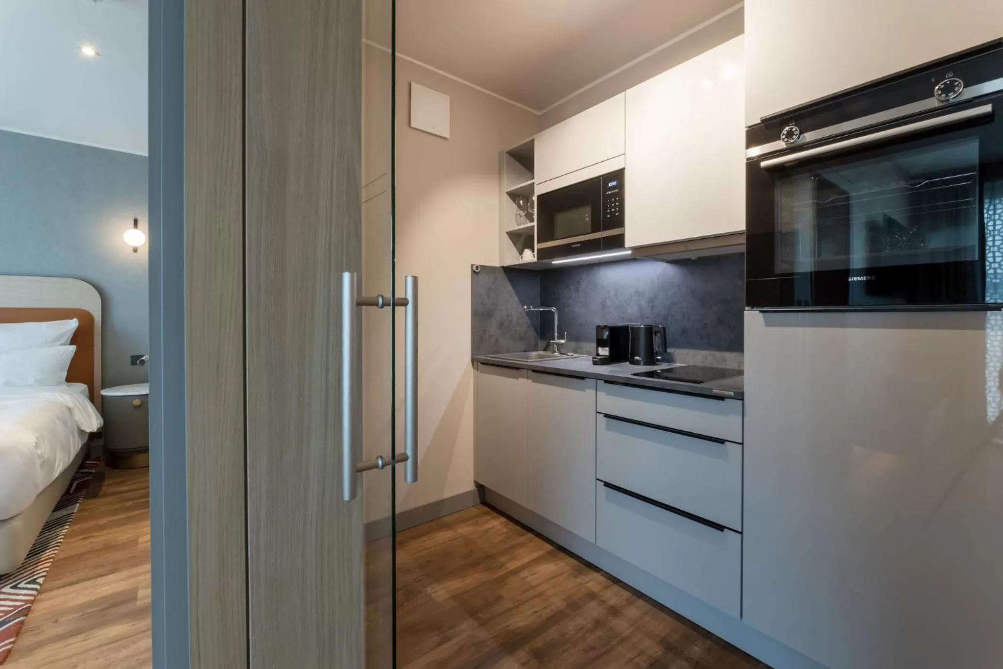 kitchen, Bed in Fourty Three Luxury Serviced Apartments