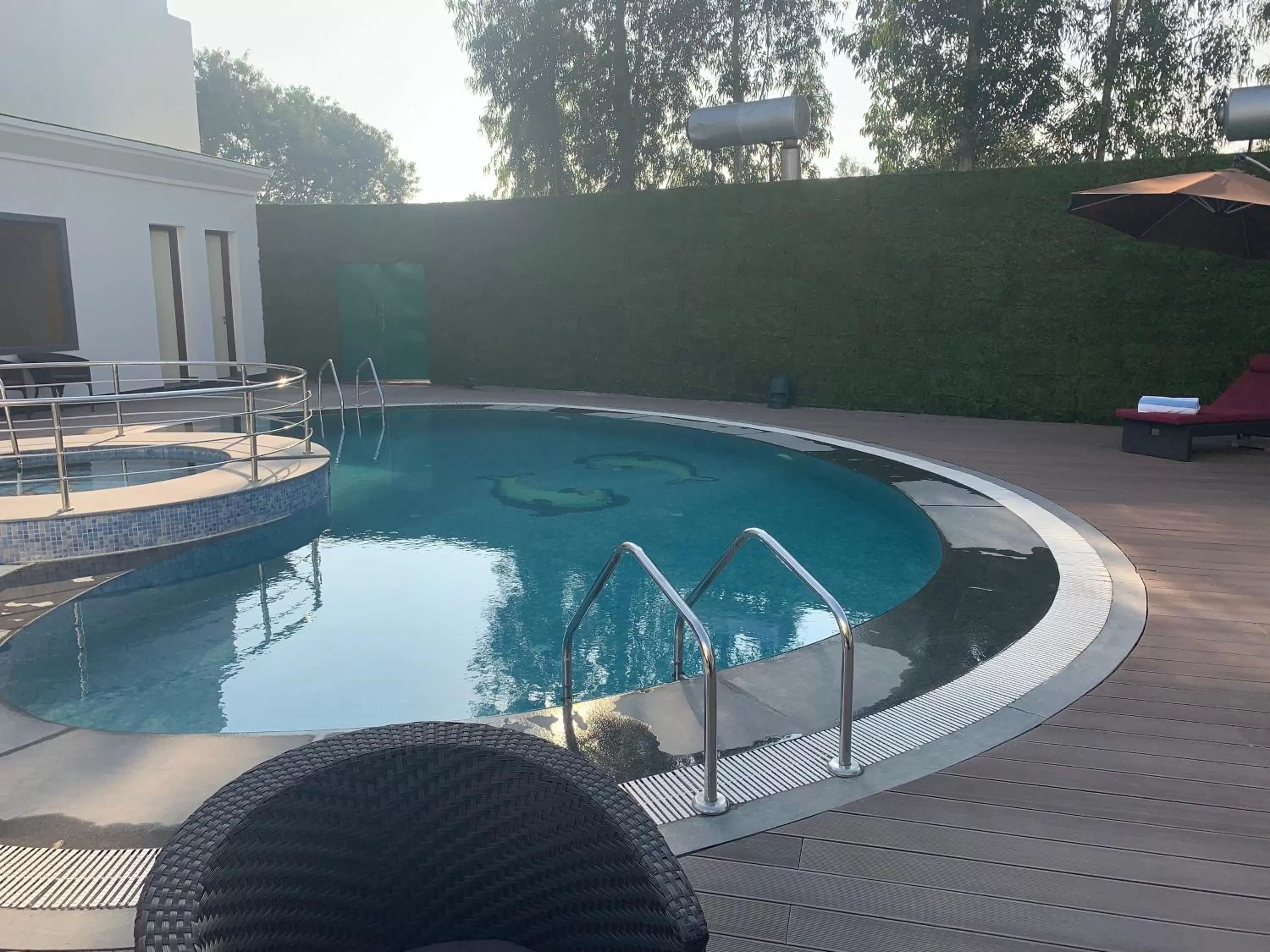 Swimming pool in Country Inn & Suites by Radisson Chandigarh Zirakpur