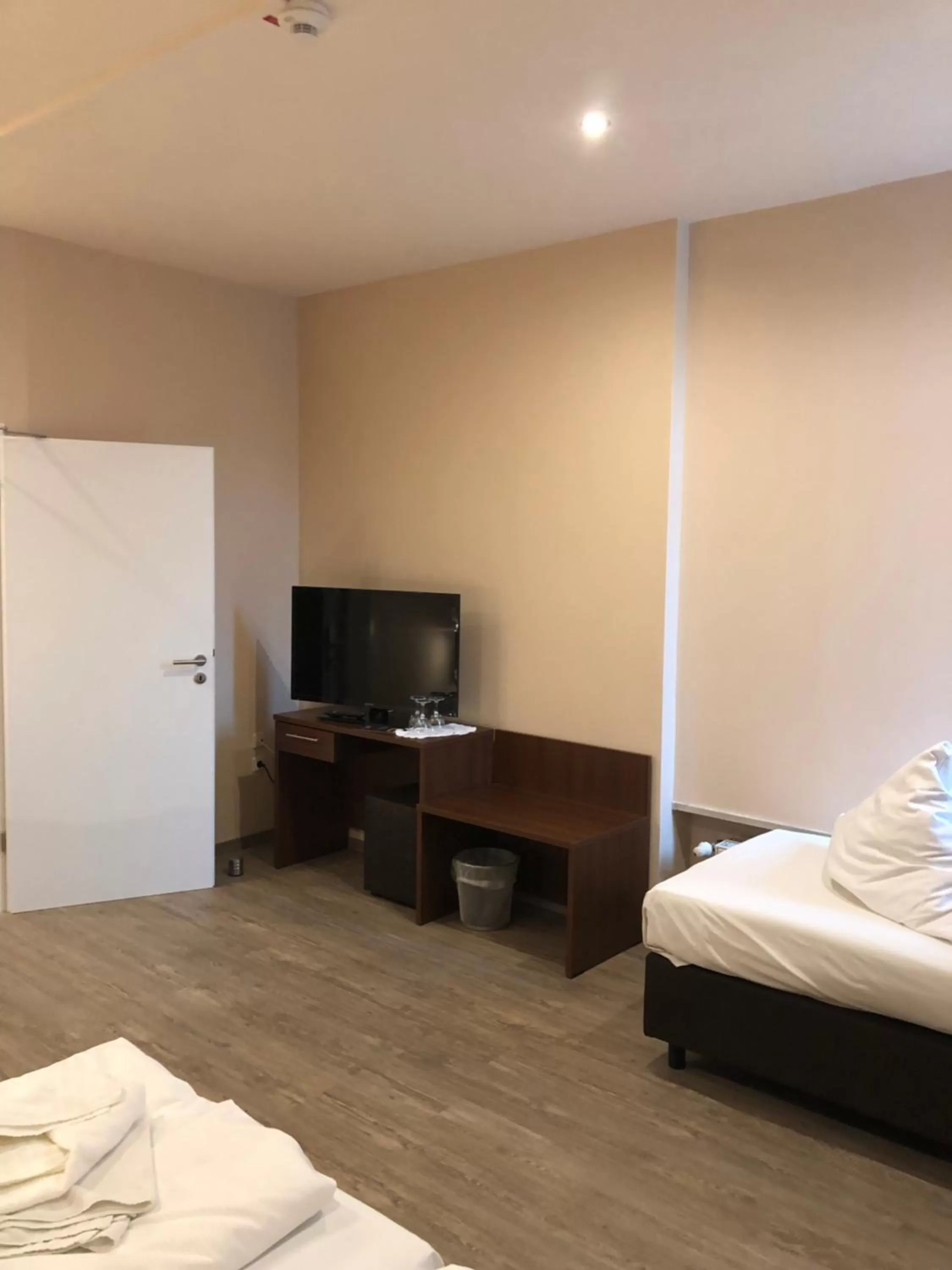 Bed in Hotel Poseidon