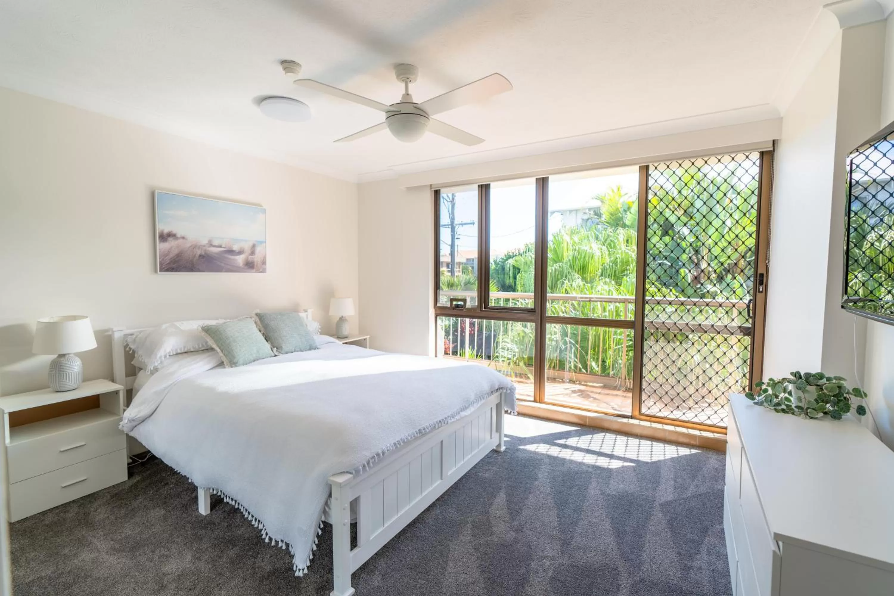 Bed in Beach Palms Holiday Apartments