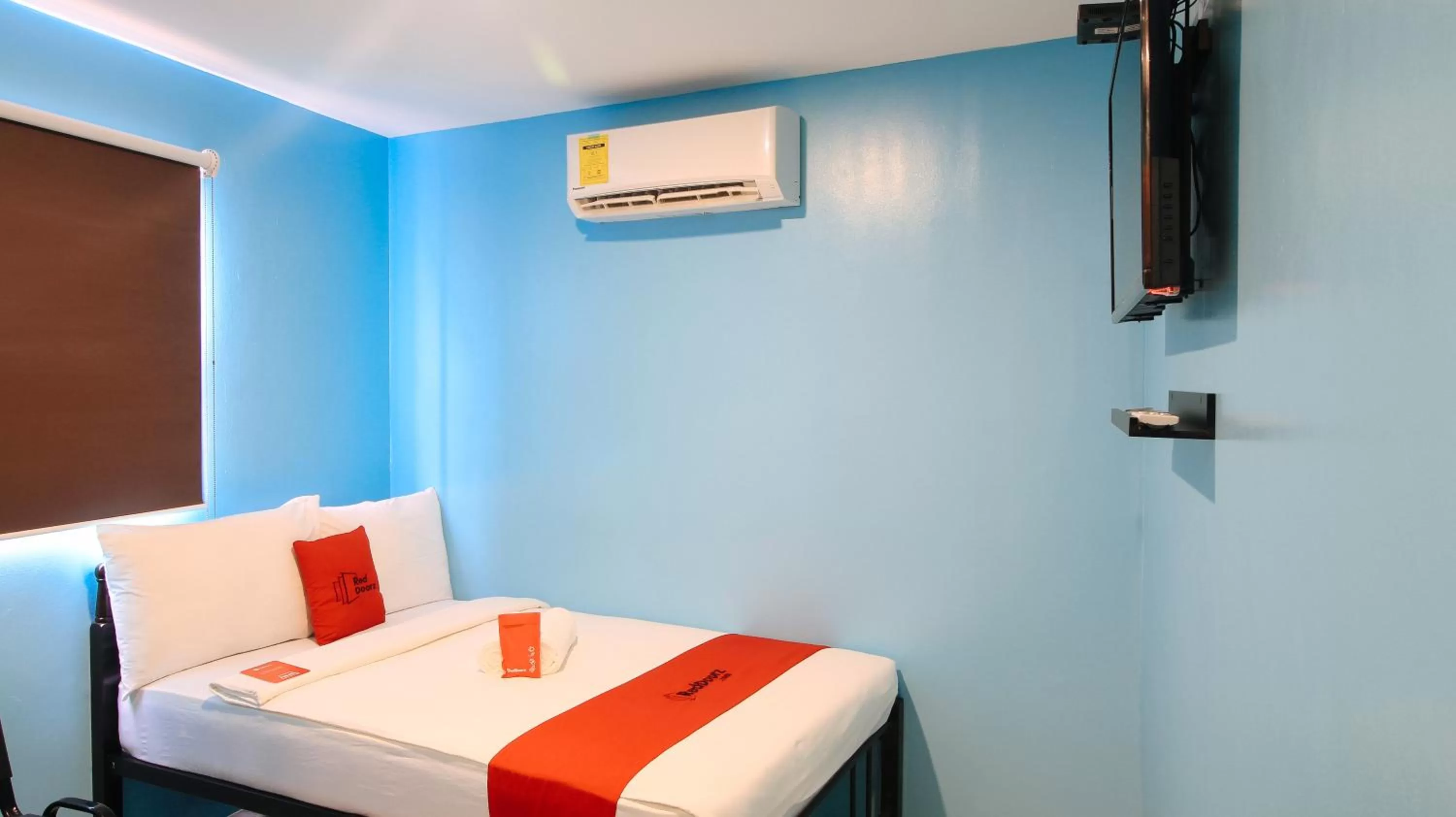 Photo of the whole room, Bed in RedDoorz at Hotel Rosemarie