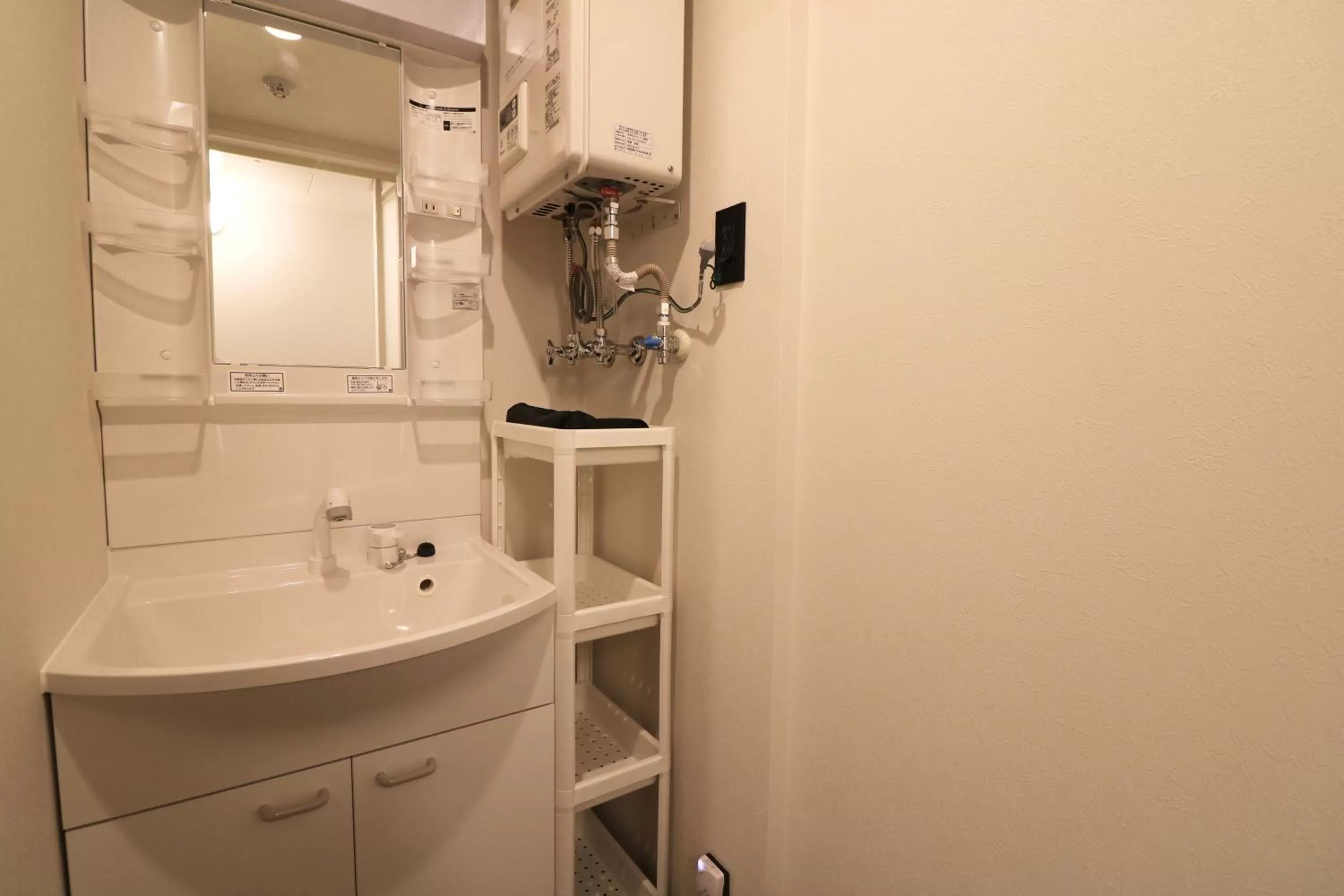 Shower in TAKETO STAY PREMIERE SAPPORO Eki