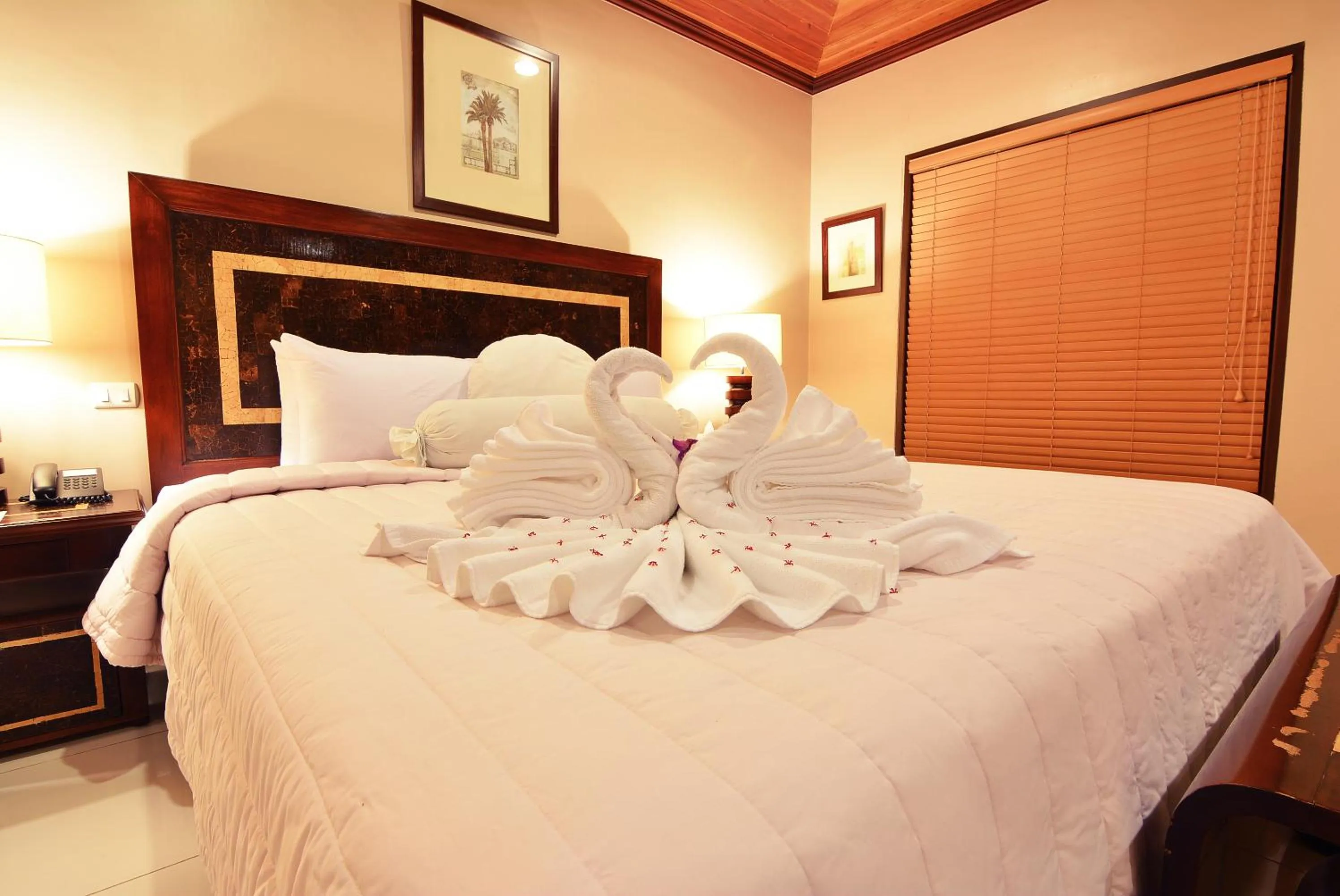 Bed in Citystate Asturias Hotel Palawan