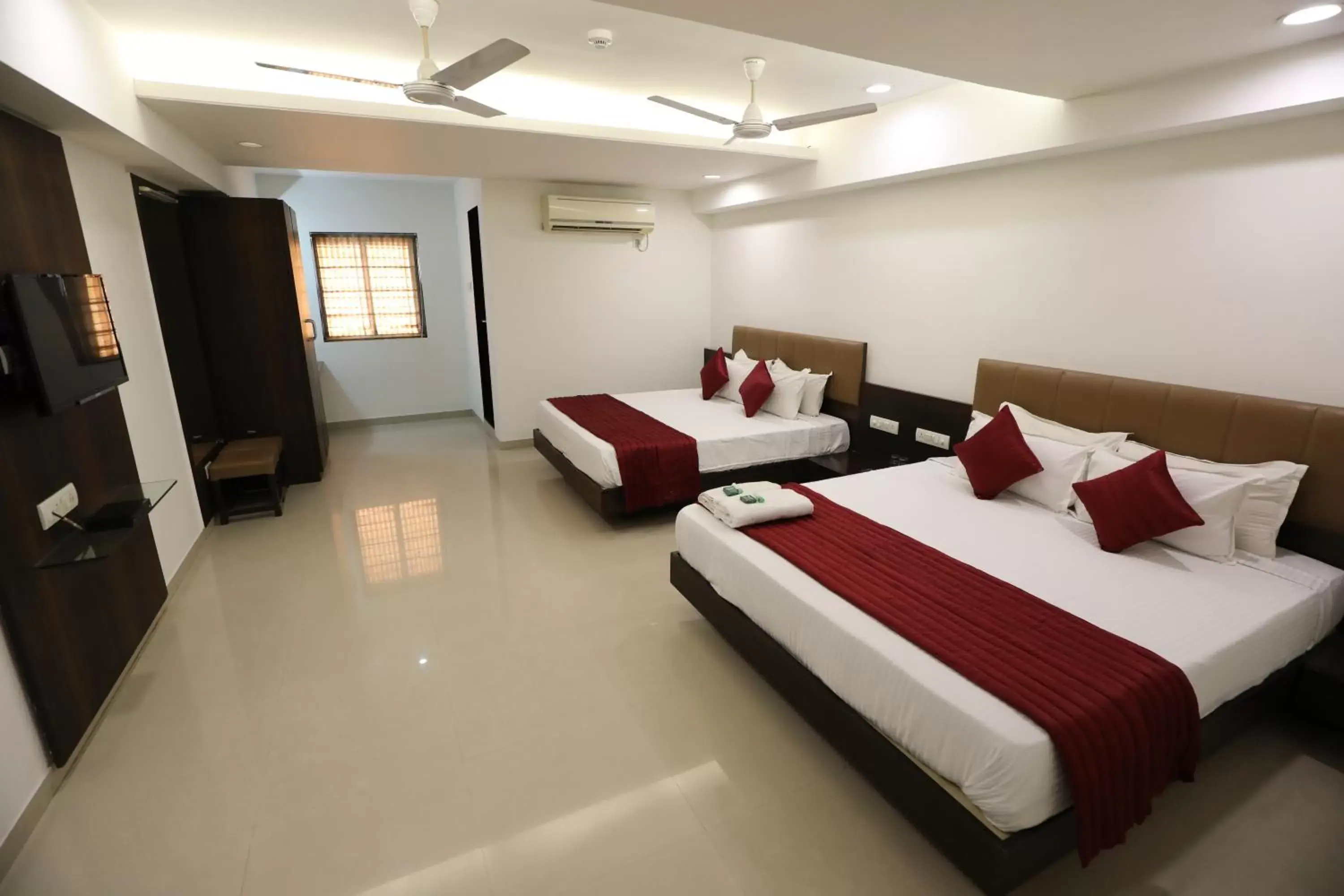 Quadruple Room - single occupancy in Hotel Shagun, Piplod City Centre Surat Quadruple Room - single occupancy in Hotel Shagun, Piplod City Centre Surat