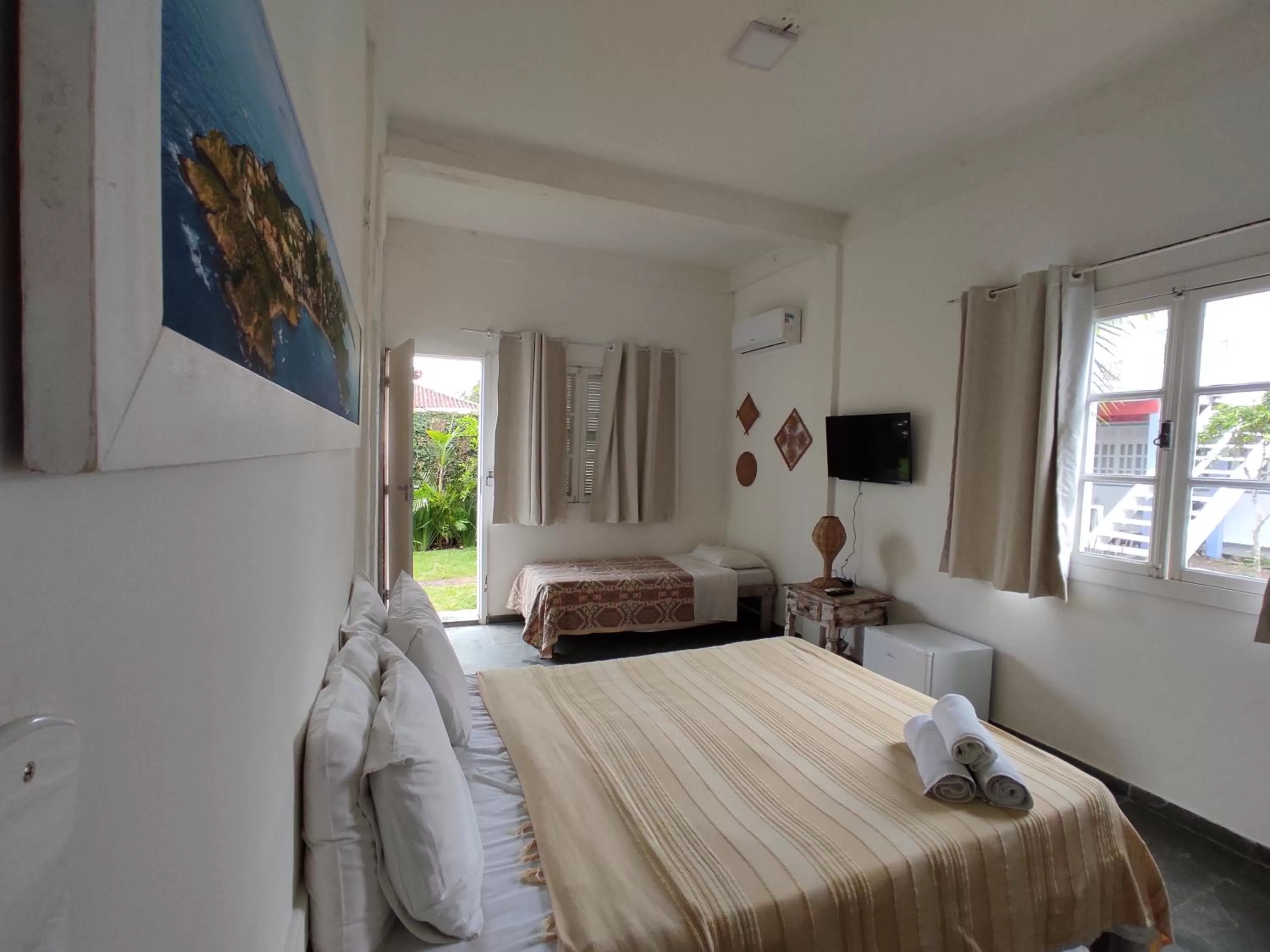 Bed in Pousada Manaaki