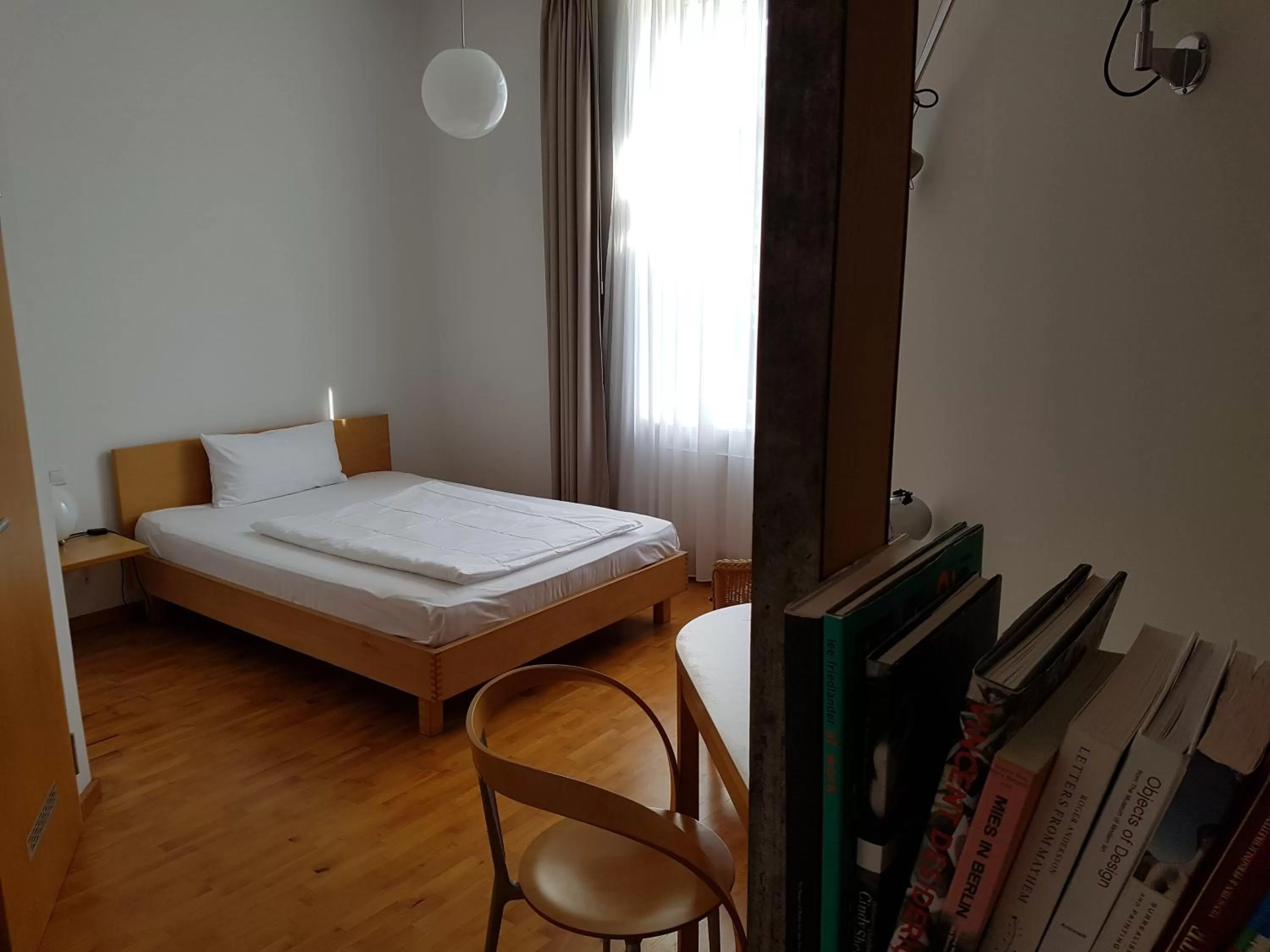 Bed in Art-Hotel Robert Mayer