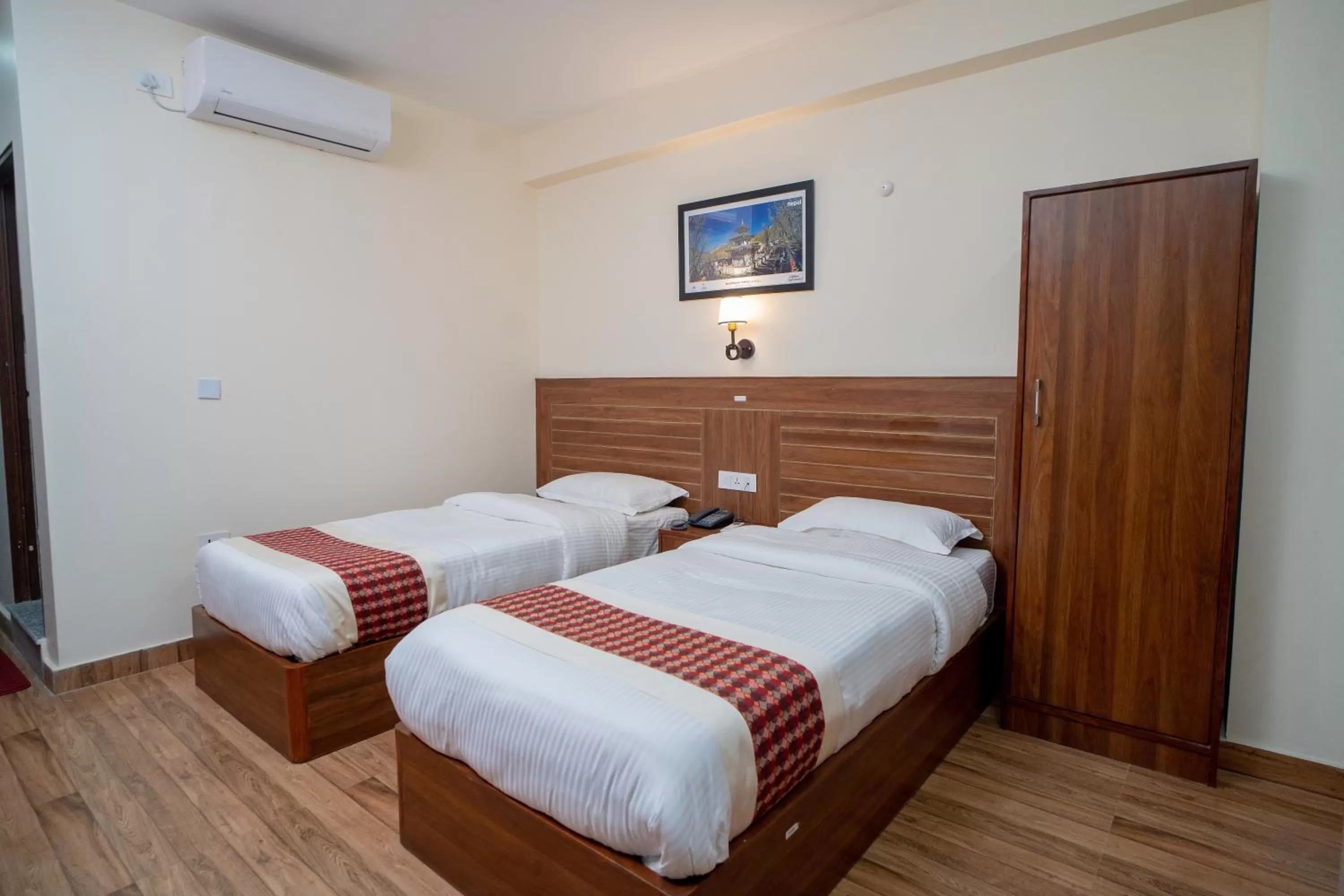 Bed in Madhuban Hotel