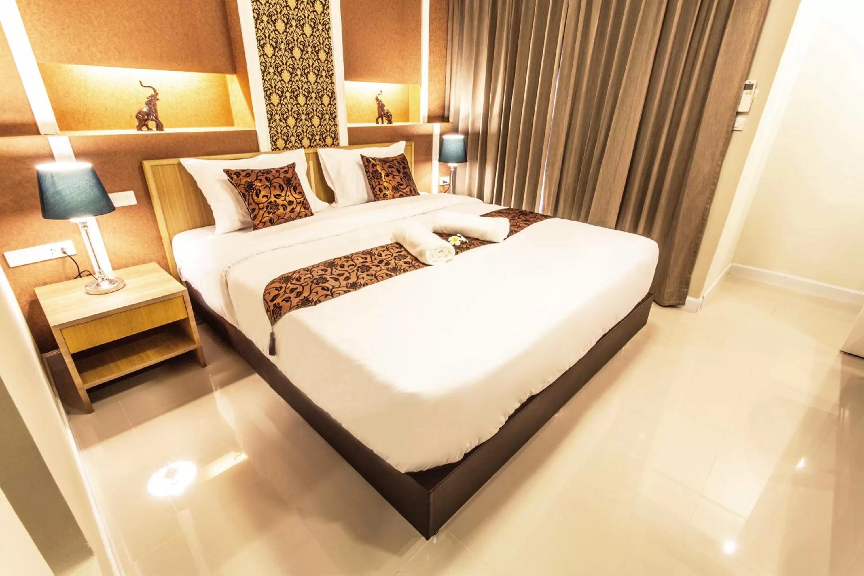 Decorative detail, Bed in The Aim Sathorn Hotel