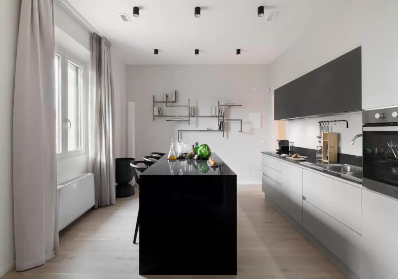 Kitchen or kitchenette in BB Hotels Aparthotel Collection Il Michelangelo