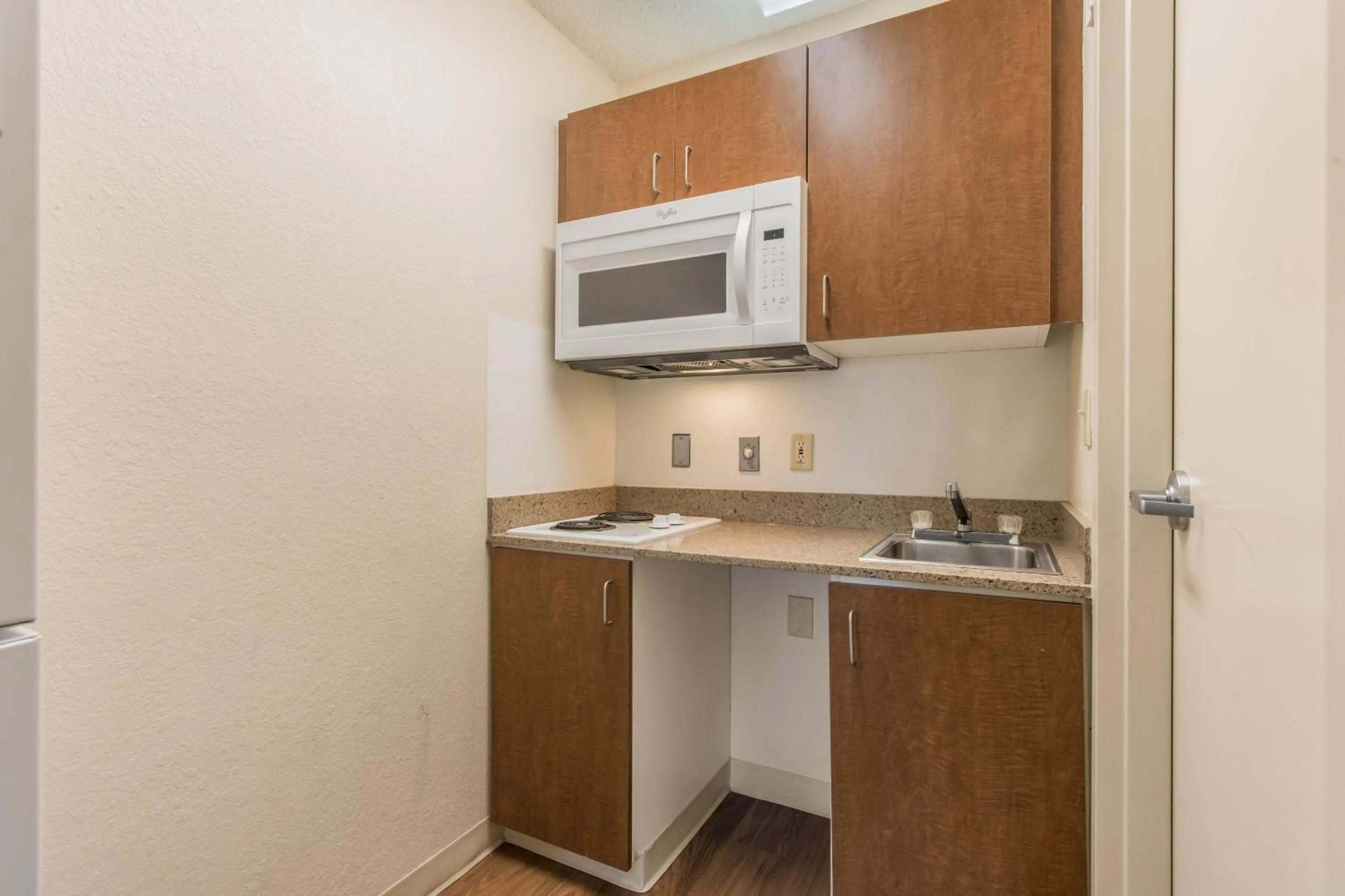 Photo of the whole room in HomeTowne Studios by Red Roof Fort Lauderdale