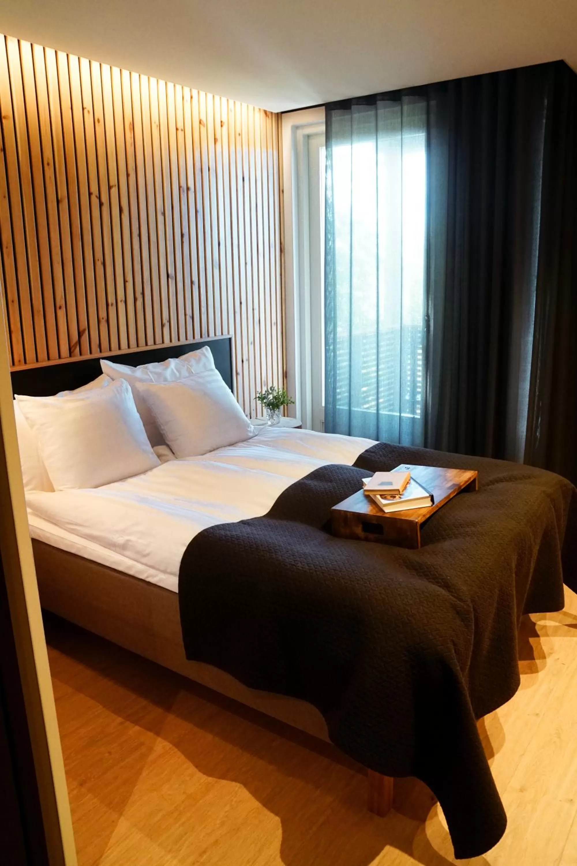 Bed in Haltia Lake Lodge nature boutique hotel & glamping