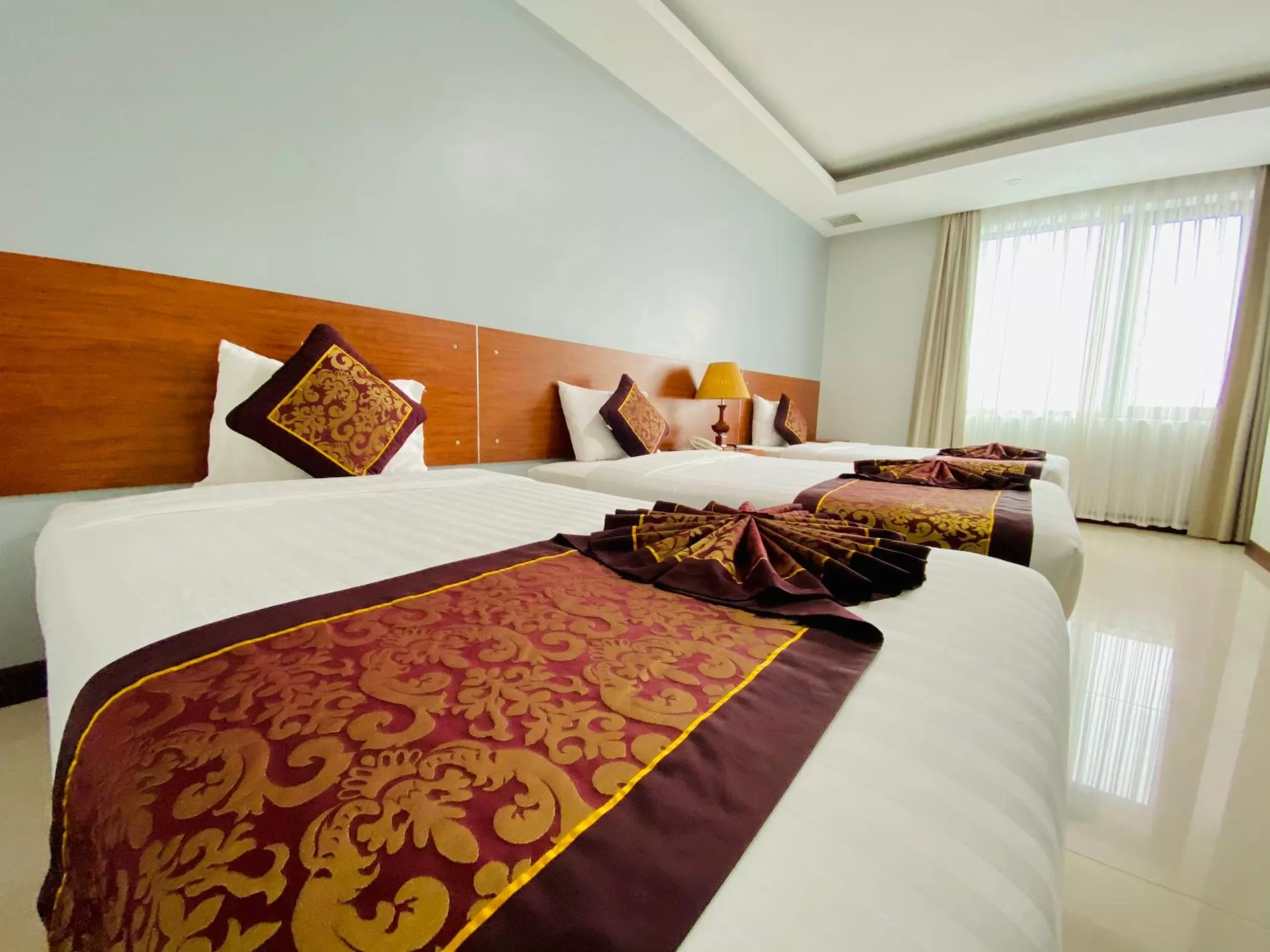 Bed in Kim Thai Hotel