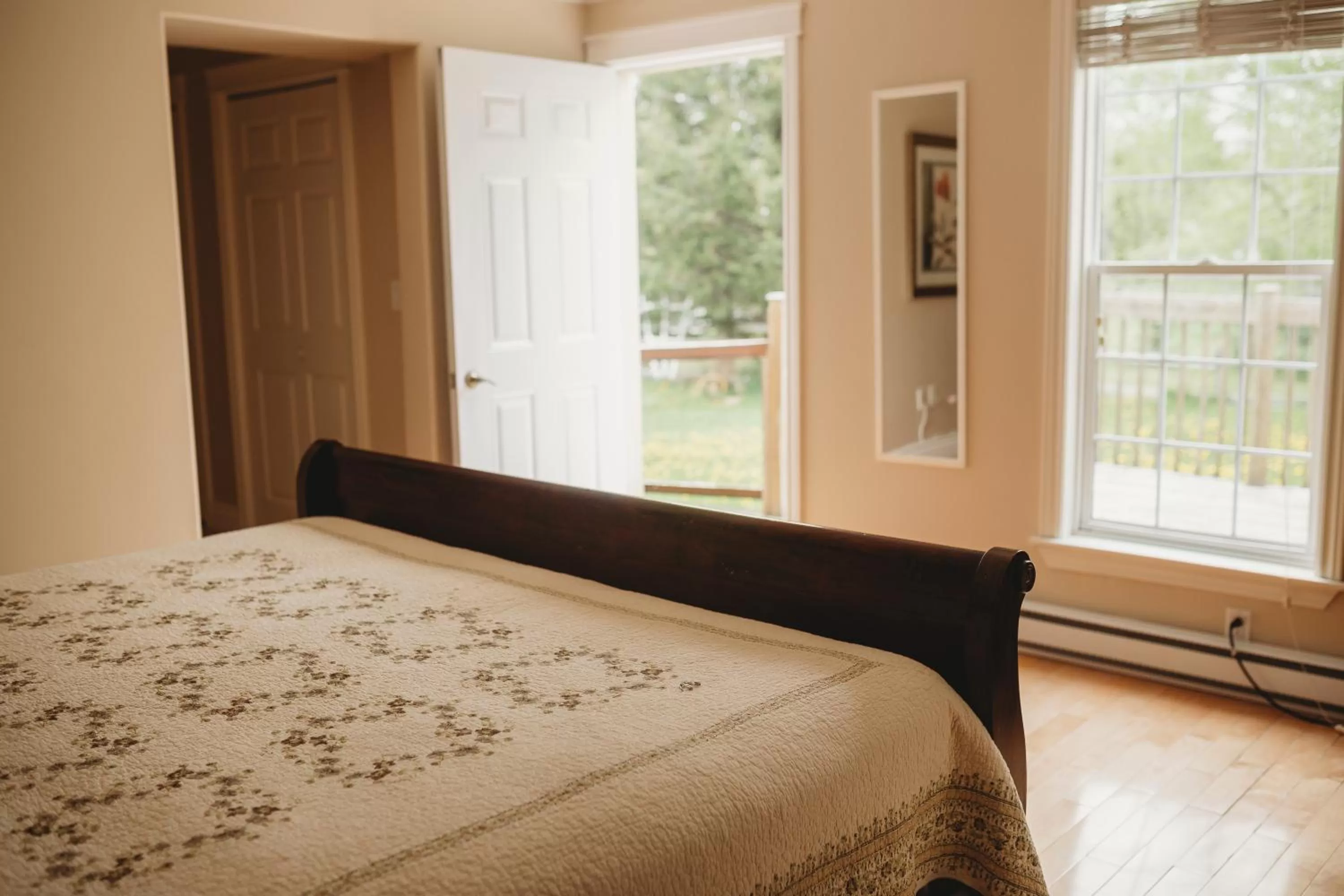 Bedroom, Bed in Carriage House Inn Four and a Half Stars