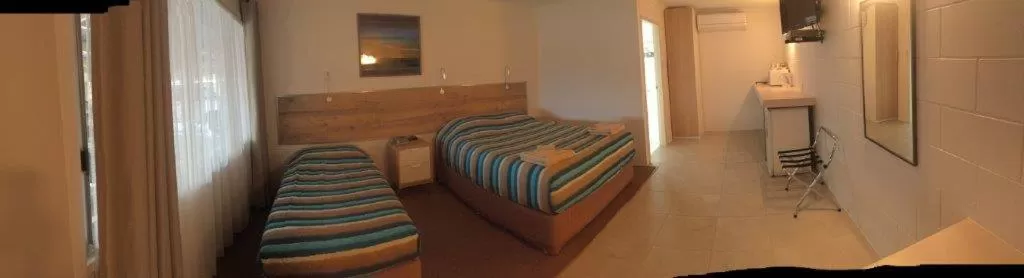 Photo of the whole room, Bed in A & A Motel