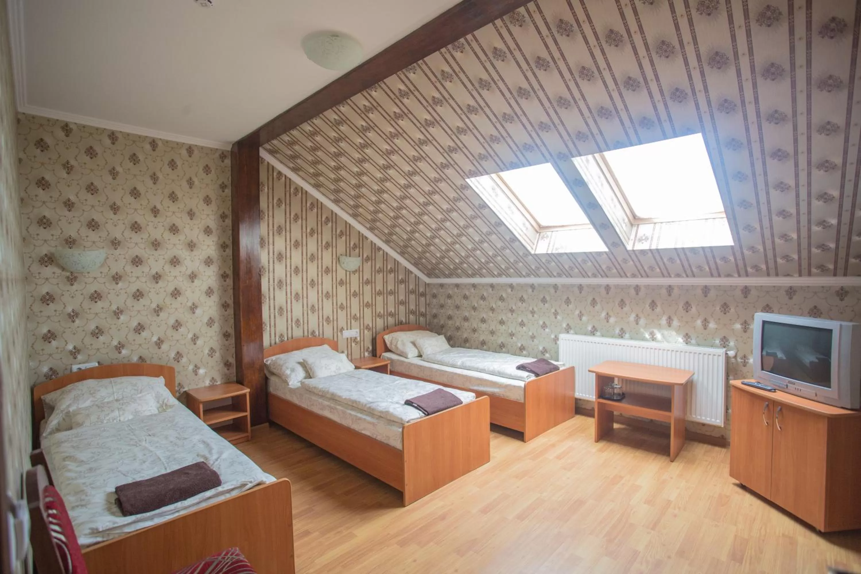 Photo of the whole room, Bed in Praktik Hotel & Restaurant