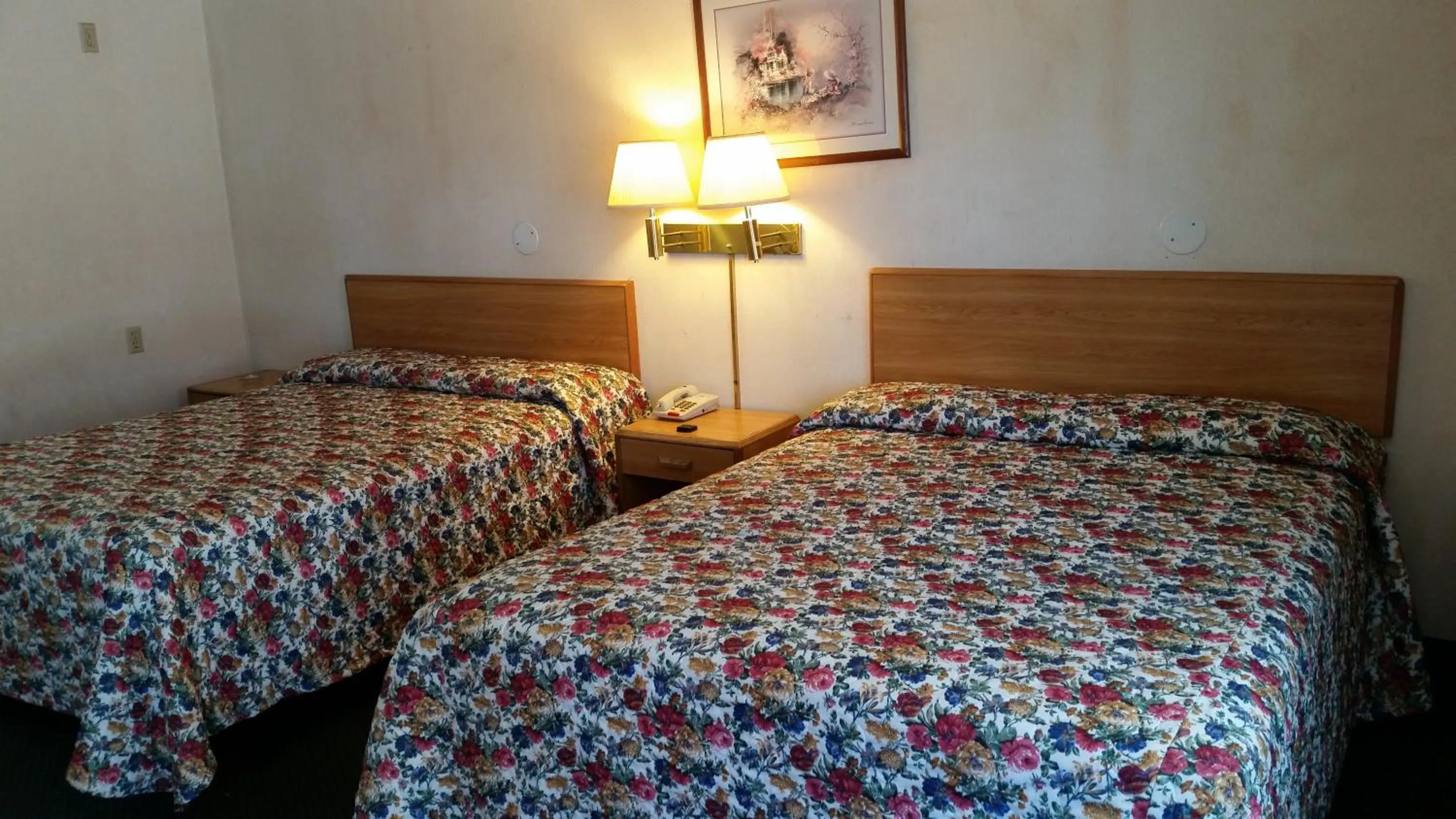 Bed in Economy Inn Motel