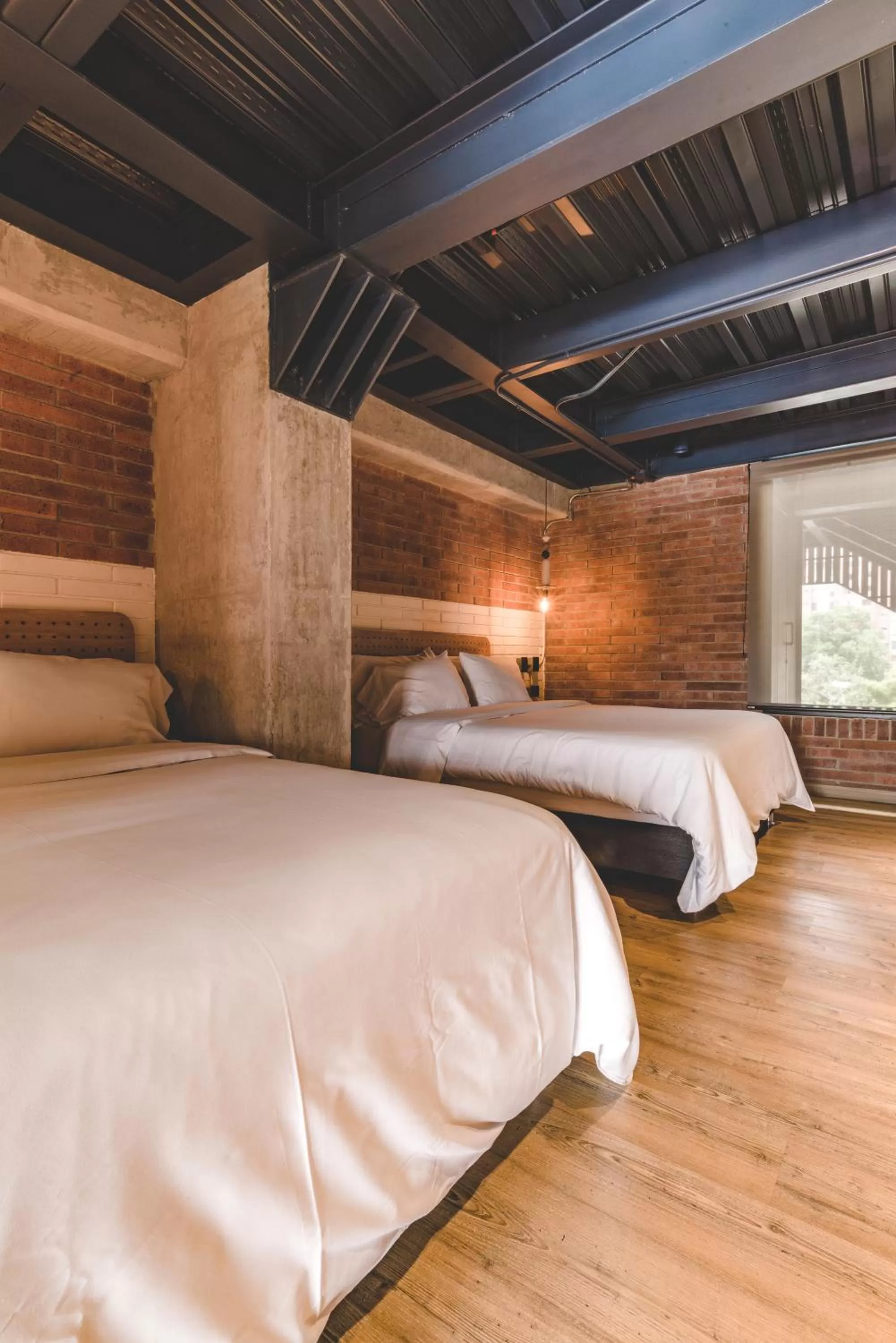 Bed in The Somos Beats Hotel & Rooftop