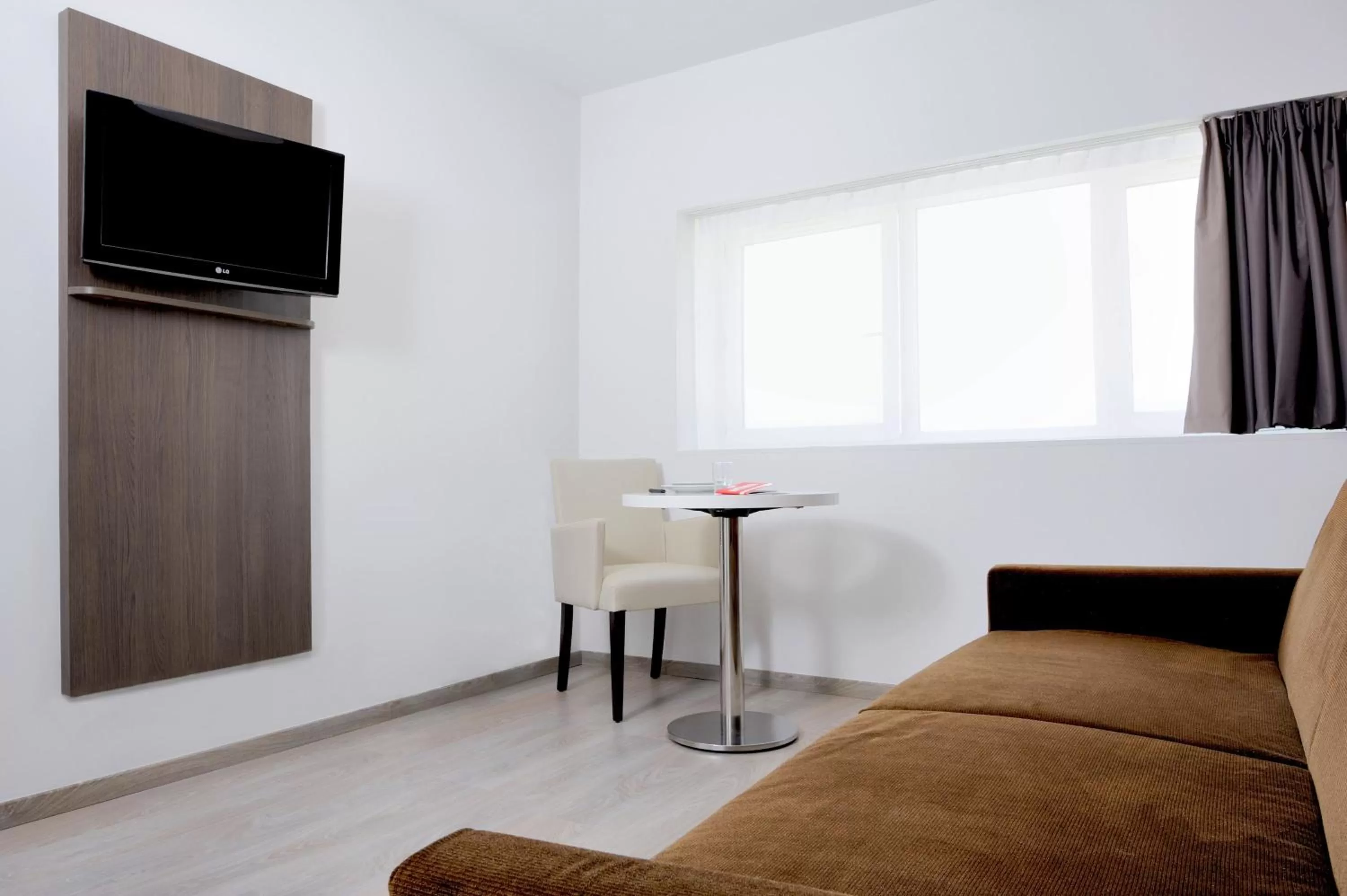 TV and multimedia in Séjours & Affaires Massy Atlantis