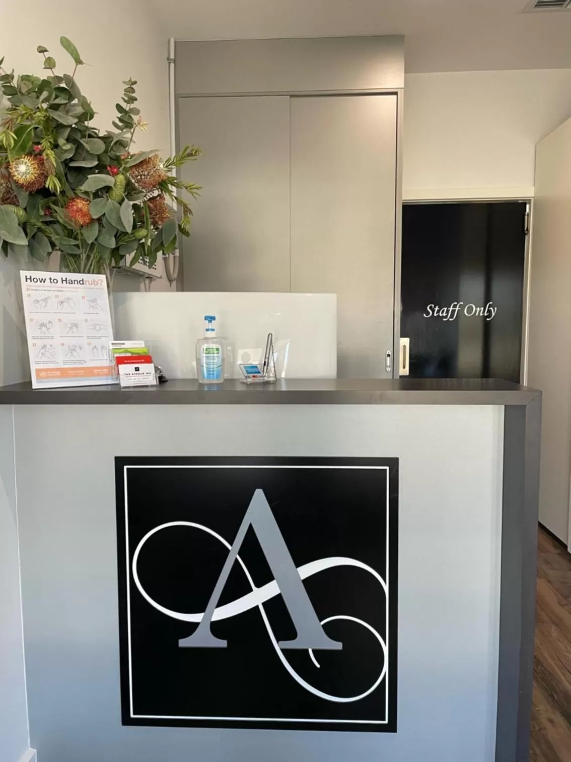 Property logo or sign in The Avenue Inn