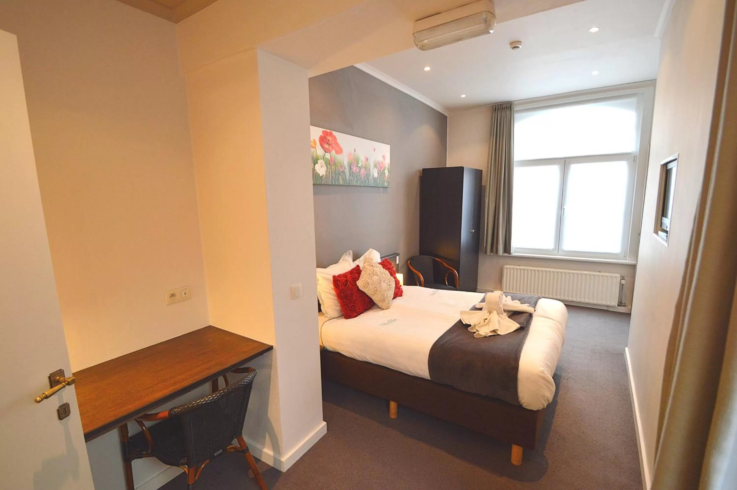 Bed in Hotel Ambrosia