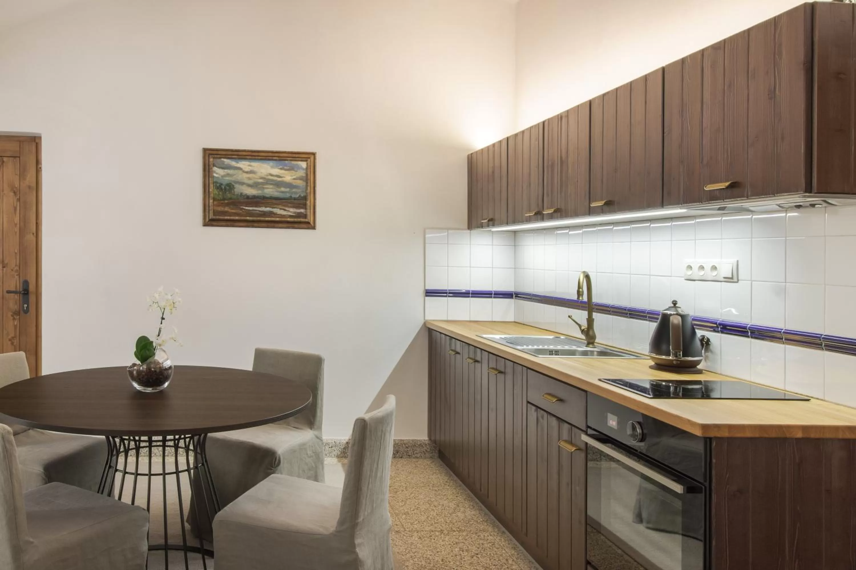 Kitchen or kitchenette in Apartmány Šupina