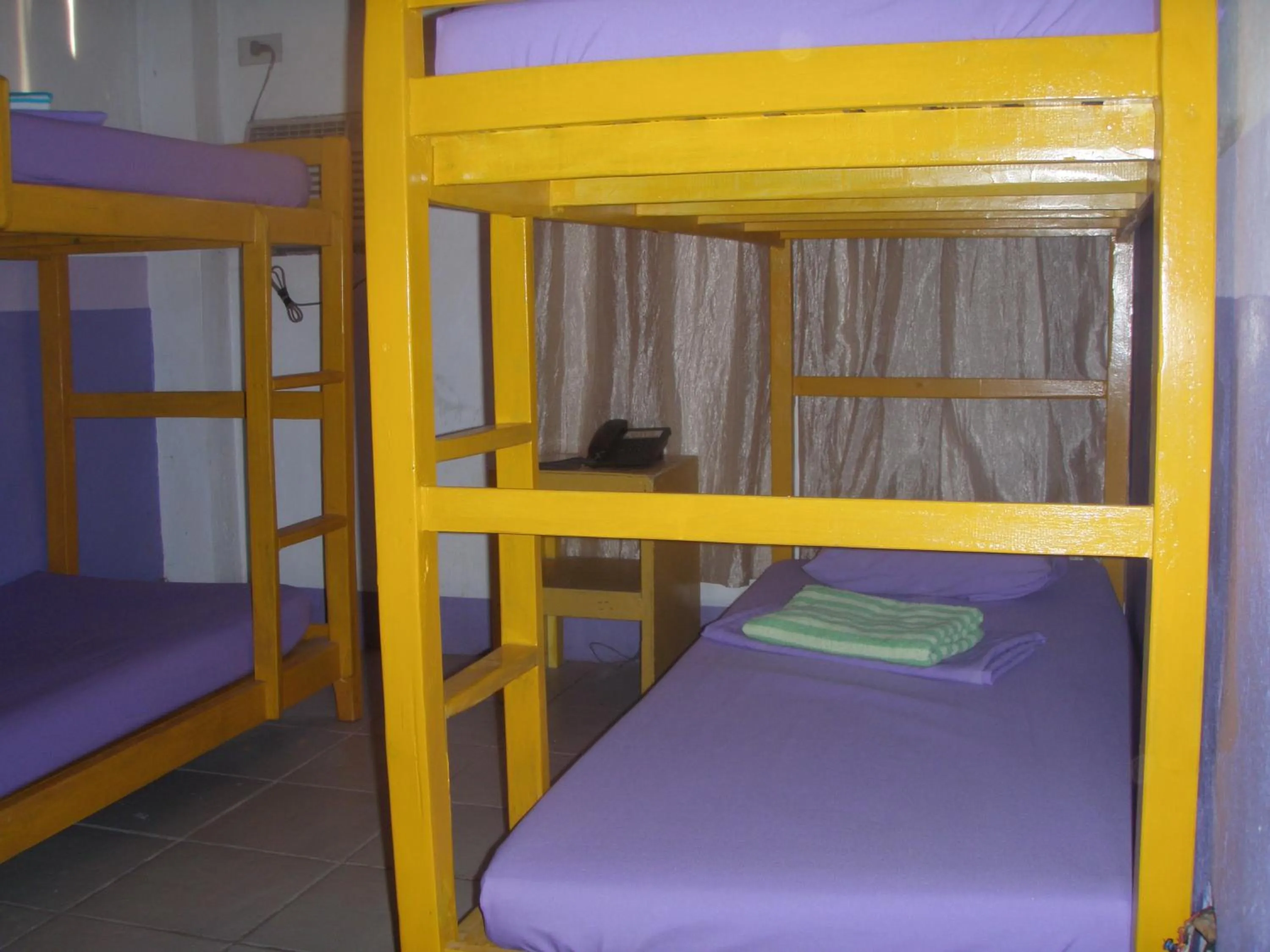 Bed in Anthurium Inn