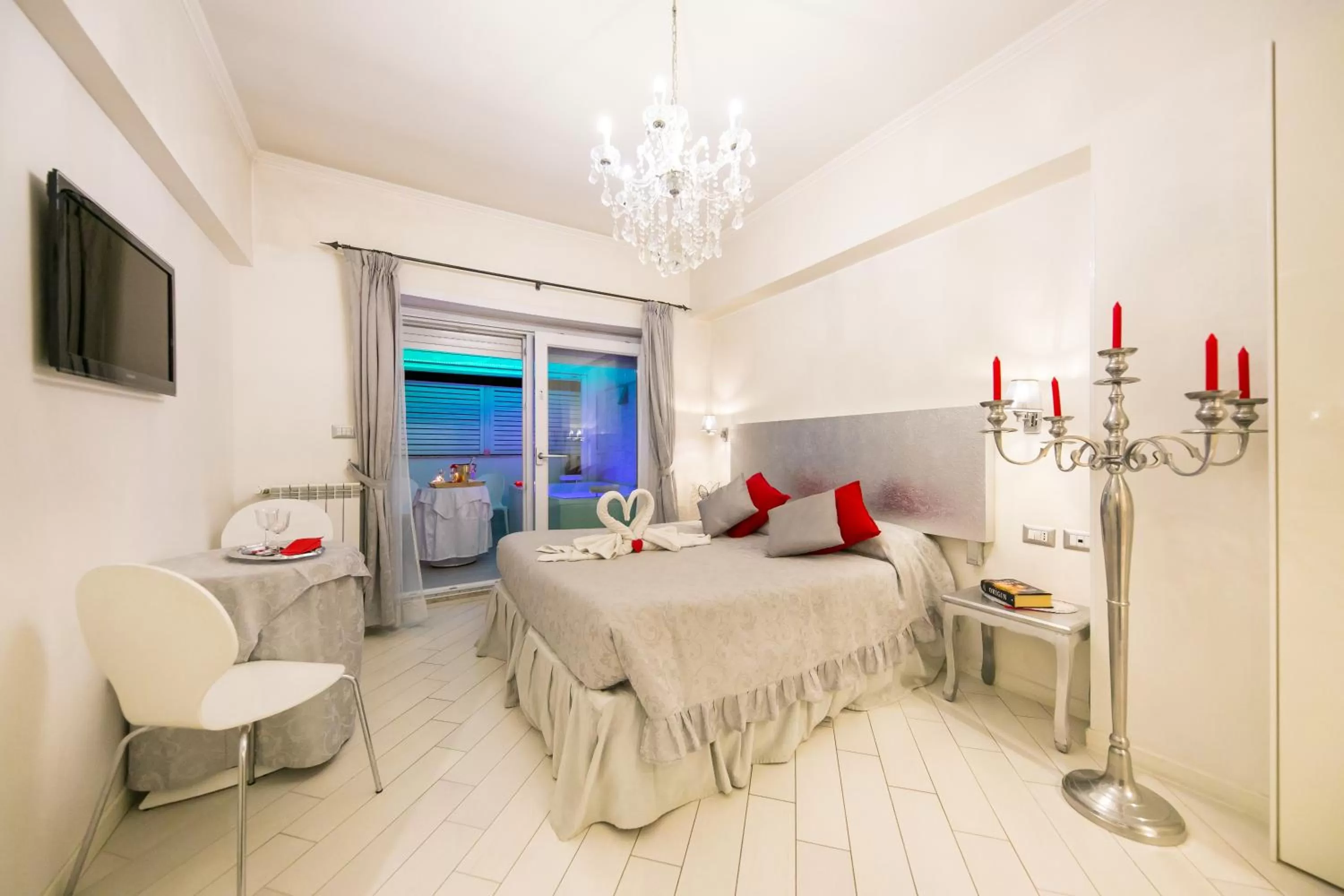 Photo of the whole room in Suites Roma Tiburtina