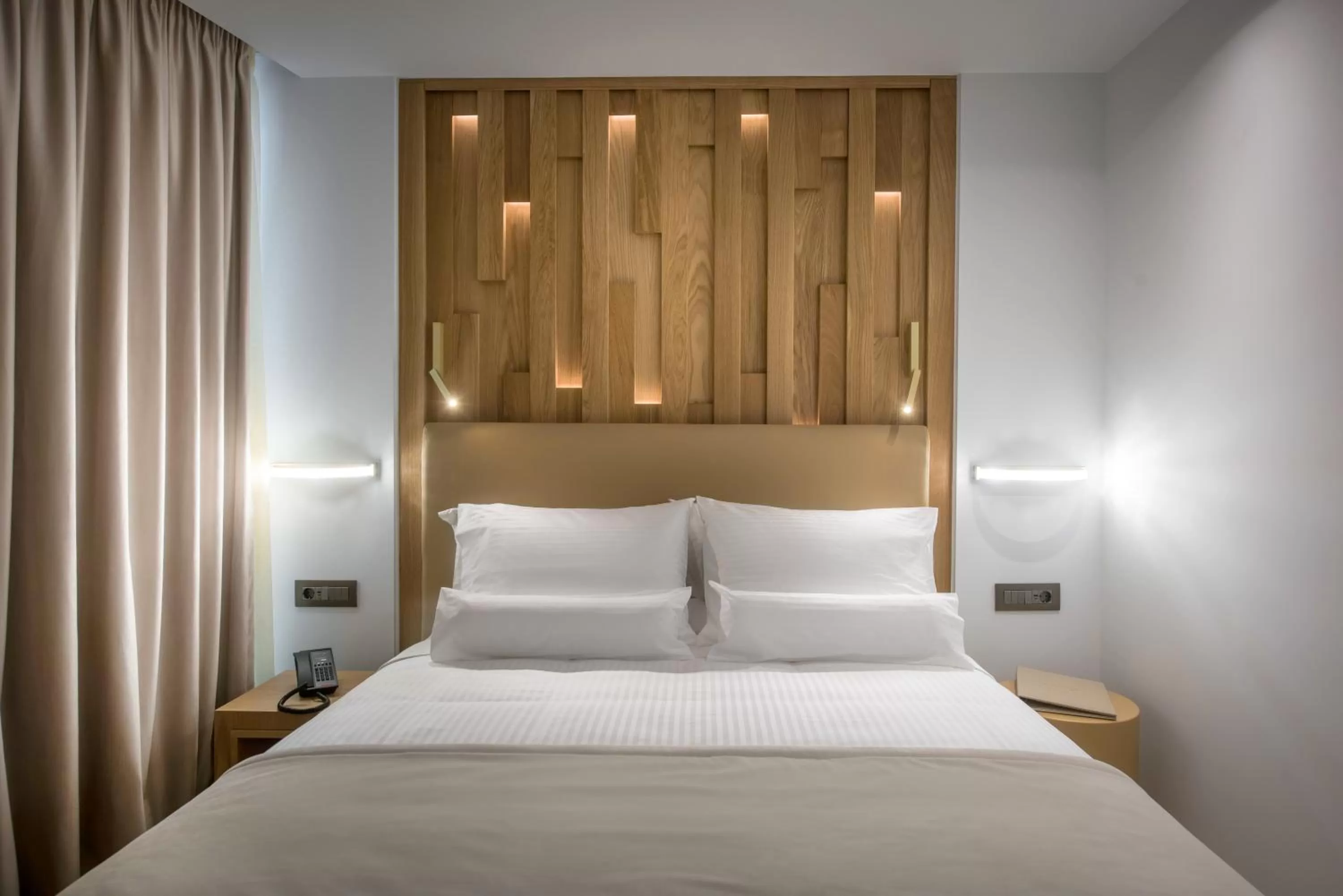 Bed in Dimargio Luxury Hotel & Spa