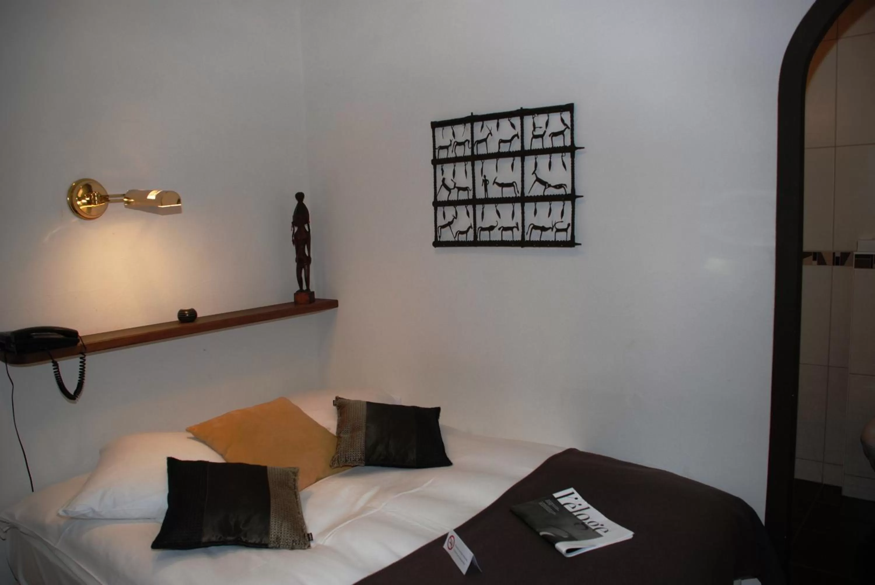 Bed in Hostellerie de Genève