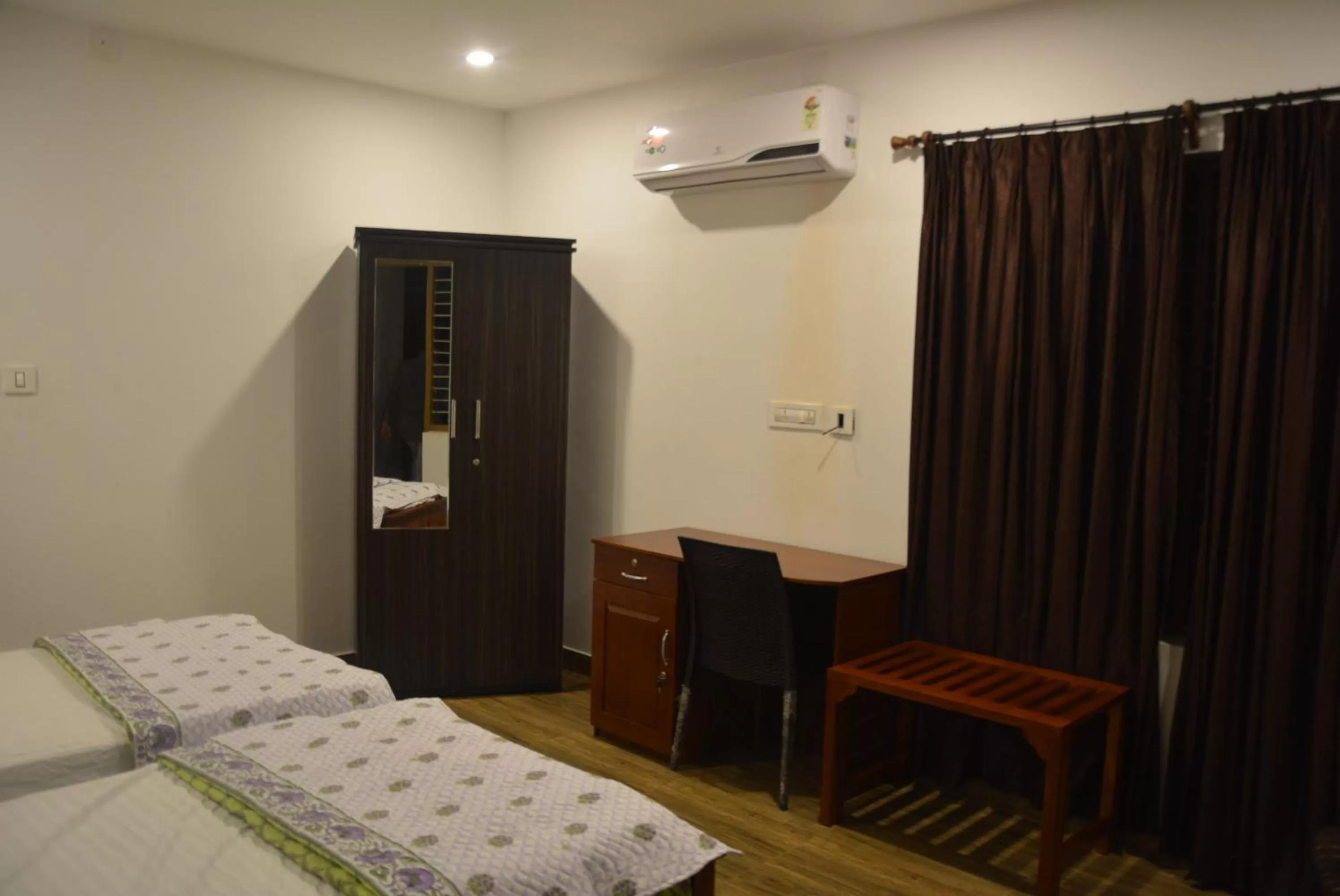 Bed in White Shell Beach House