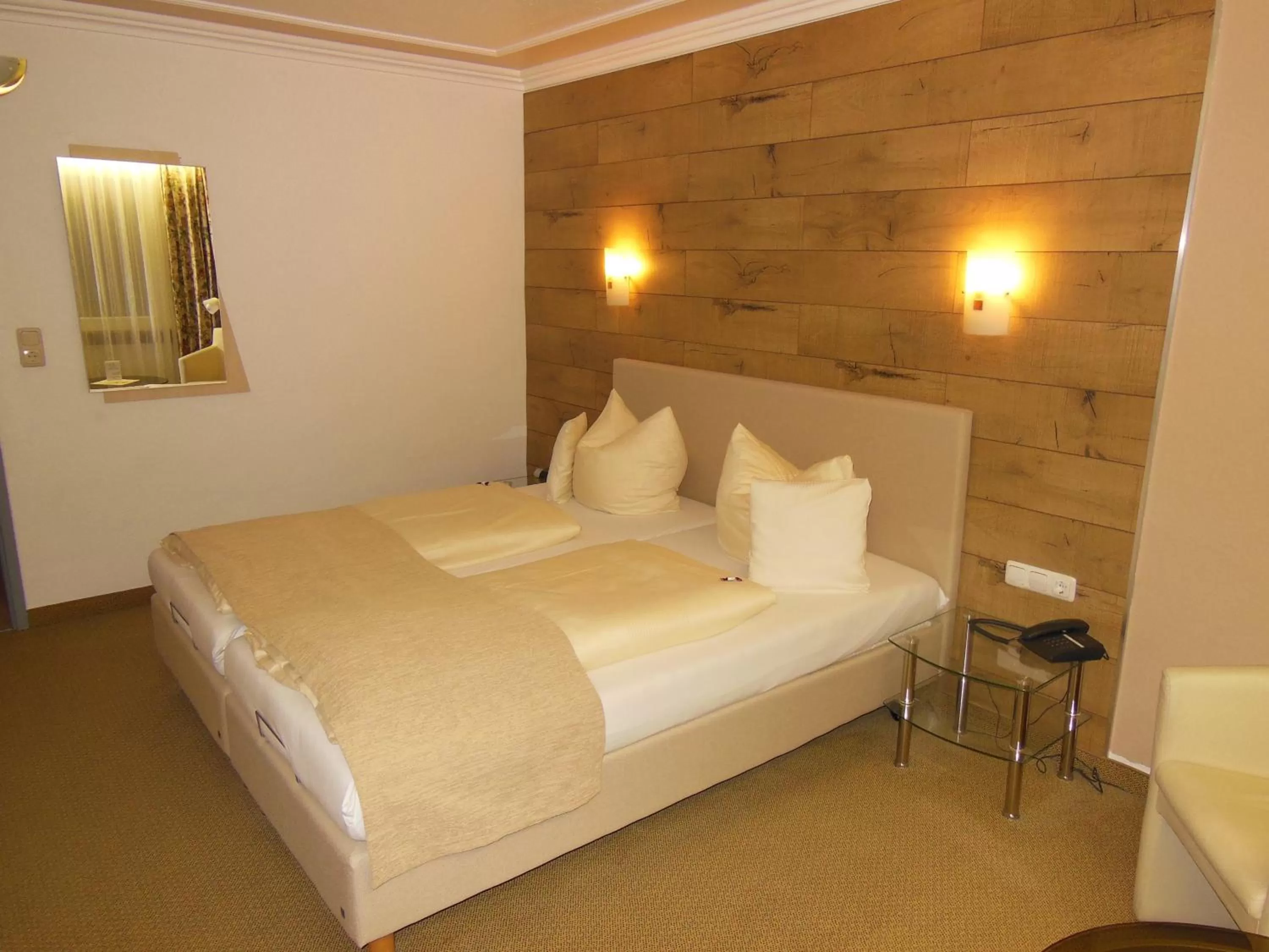 Photo of the whole room, Bed in Parkhotel Tannenhof