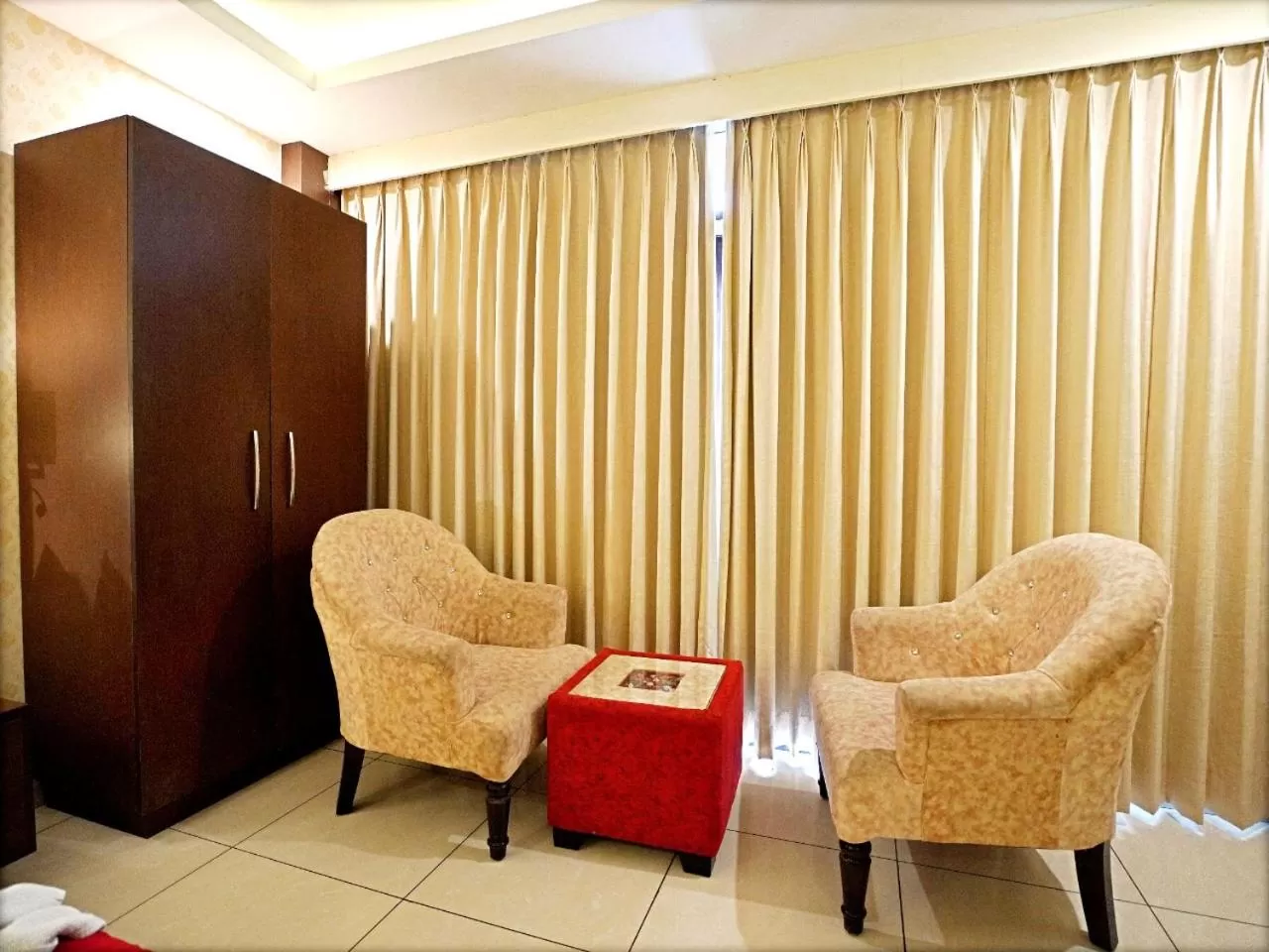 Seating area in Indira Nikunj Rubystone Exotic