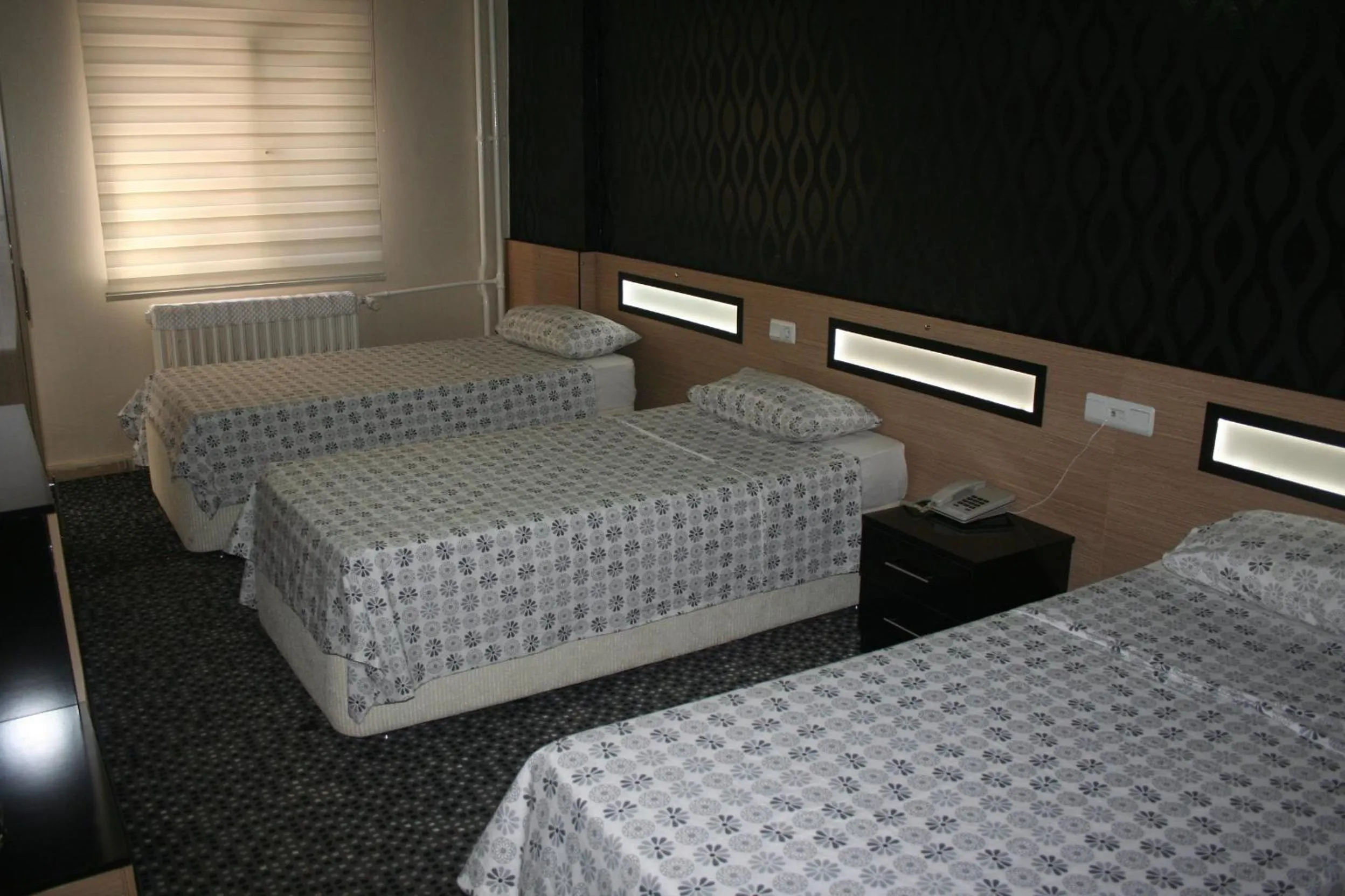 Bed in Yeni Kosk Esra Hotel
