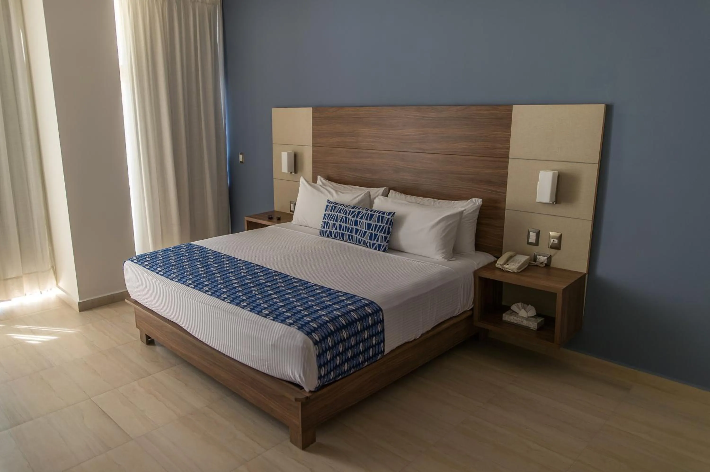 Photo of the whole room, Bed in Ocean View Beach Hotel