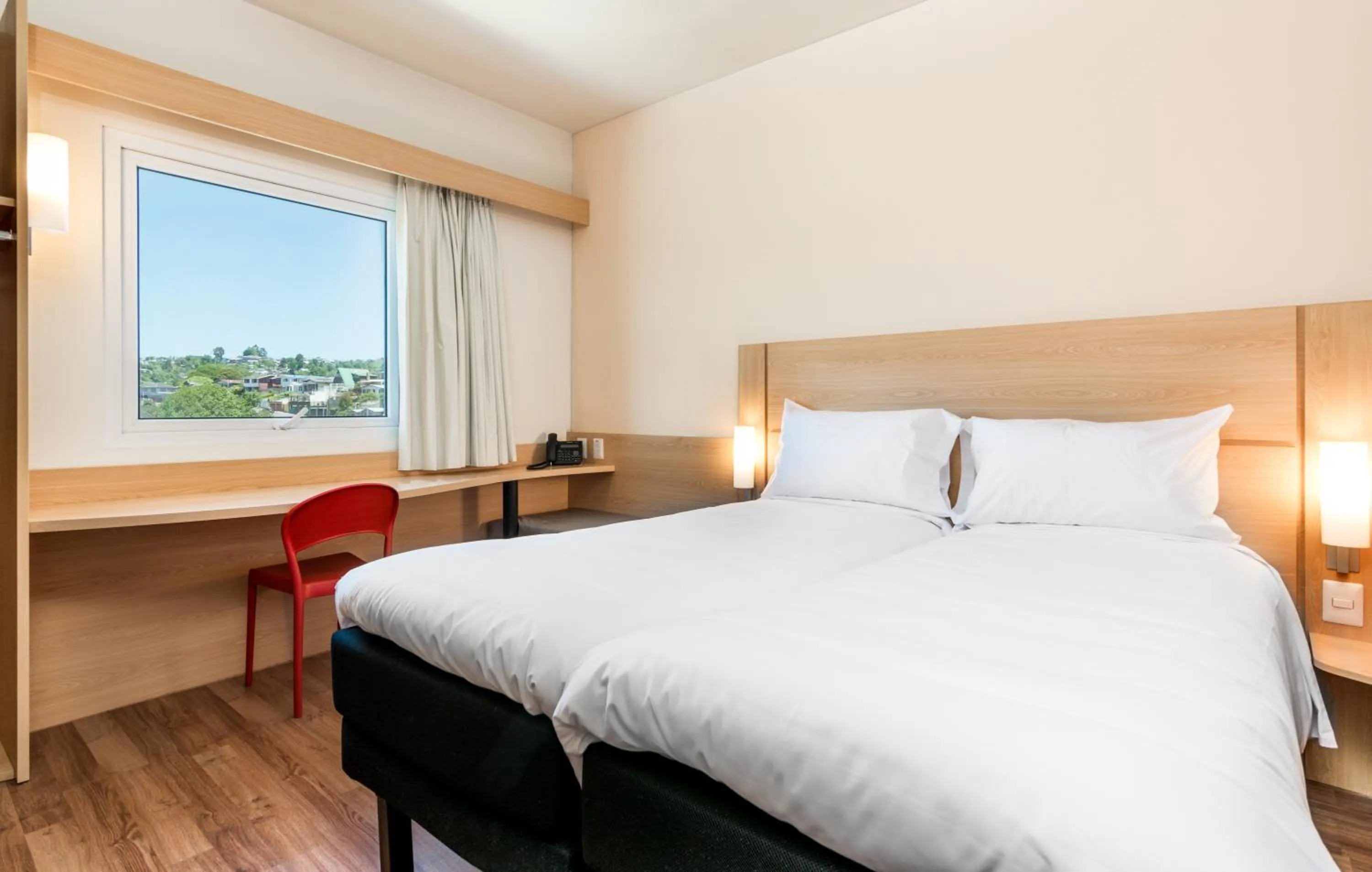 Photo of the whole room, Bed in ibis Puerto Montt